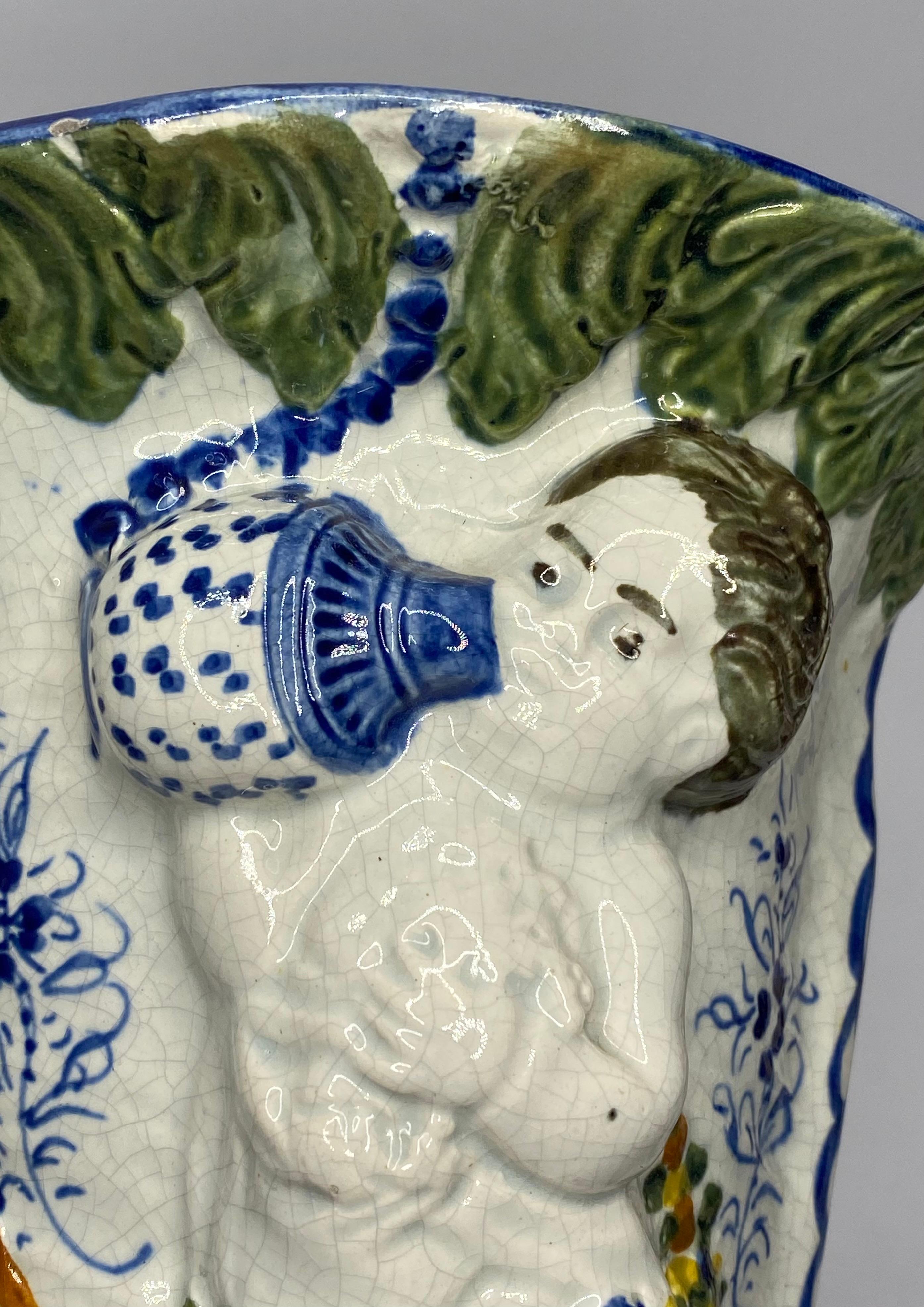 Pair Prattware Cupid wall pockets, c. 1810. In Excellent Condition For Sale In Gargrave, North Yorkshire