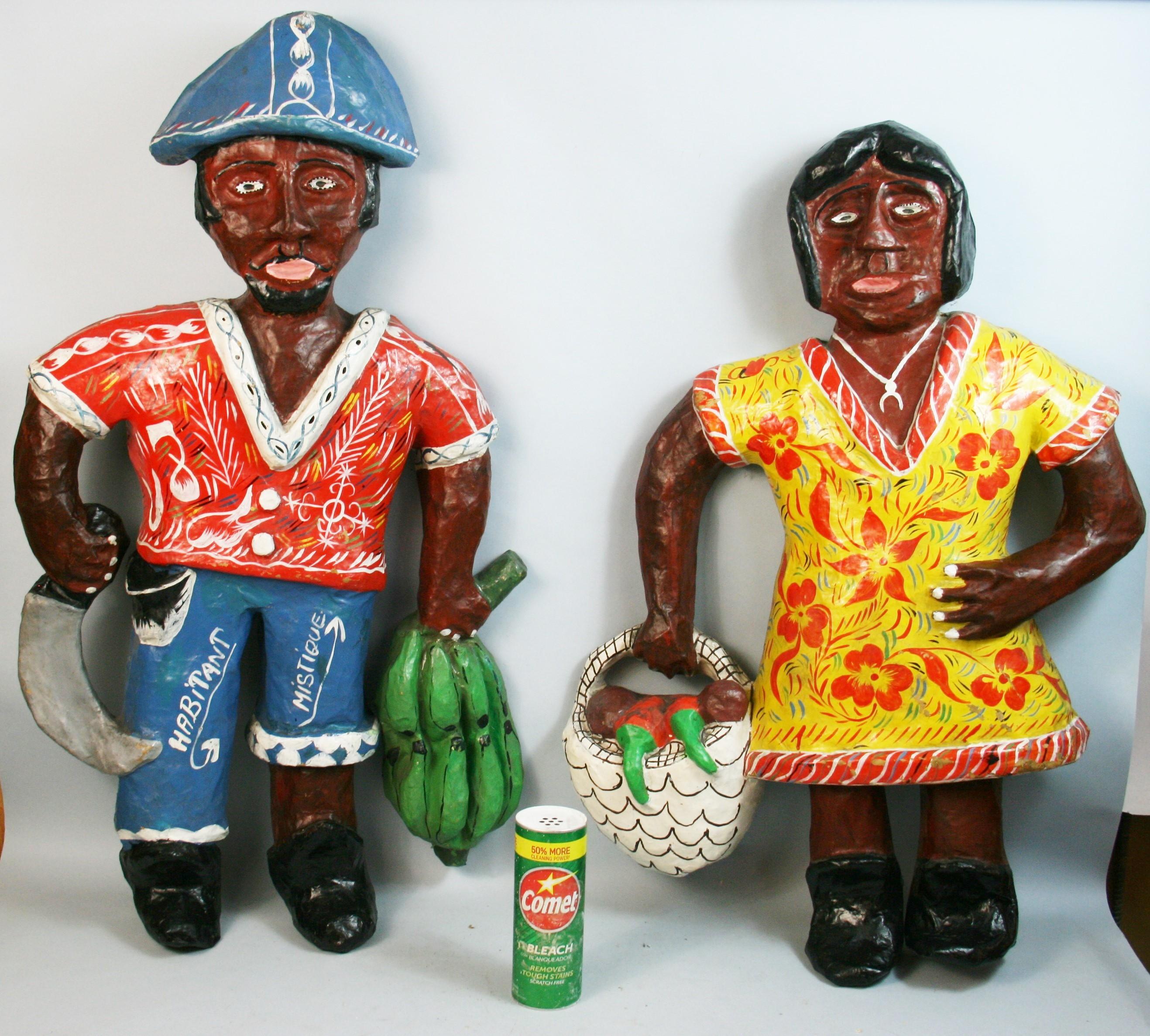1482 Pair Primitive hand made and painted Caribbean figural wall sculptures
made from corrugated boxes and hand painted