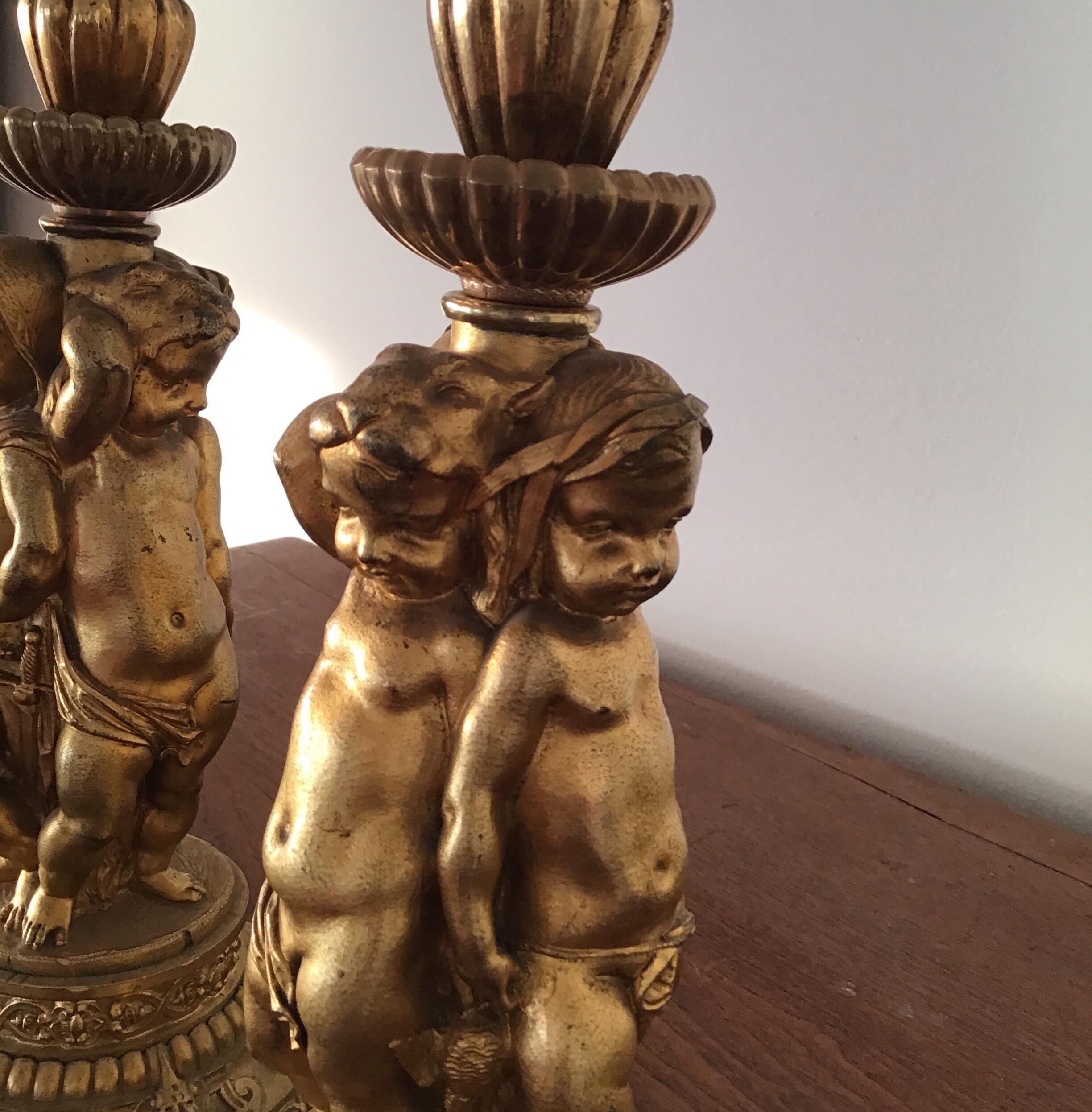 Early 20th Century Pair of Figural Cherubs Ormolu   Candlesticks 1920's For Sale