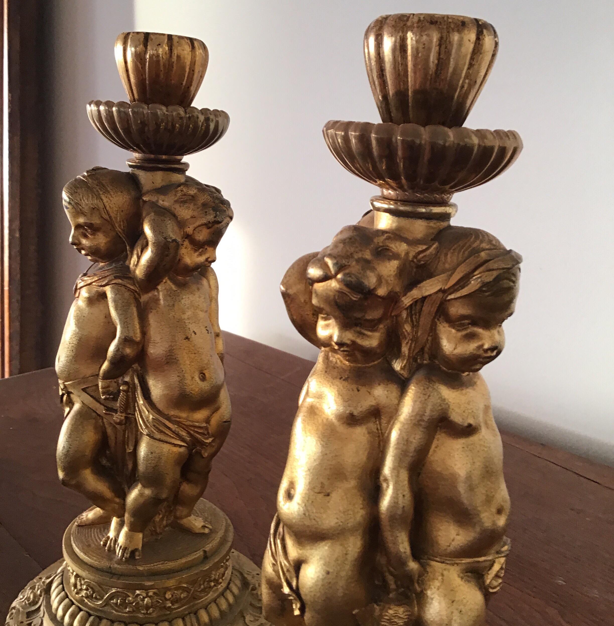 Bronze Pair of Figural Cherubs Ormolu   Candlesticks 1920's For Sale