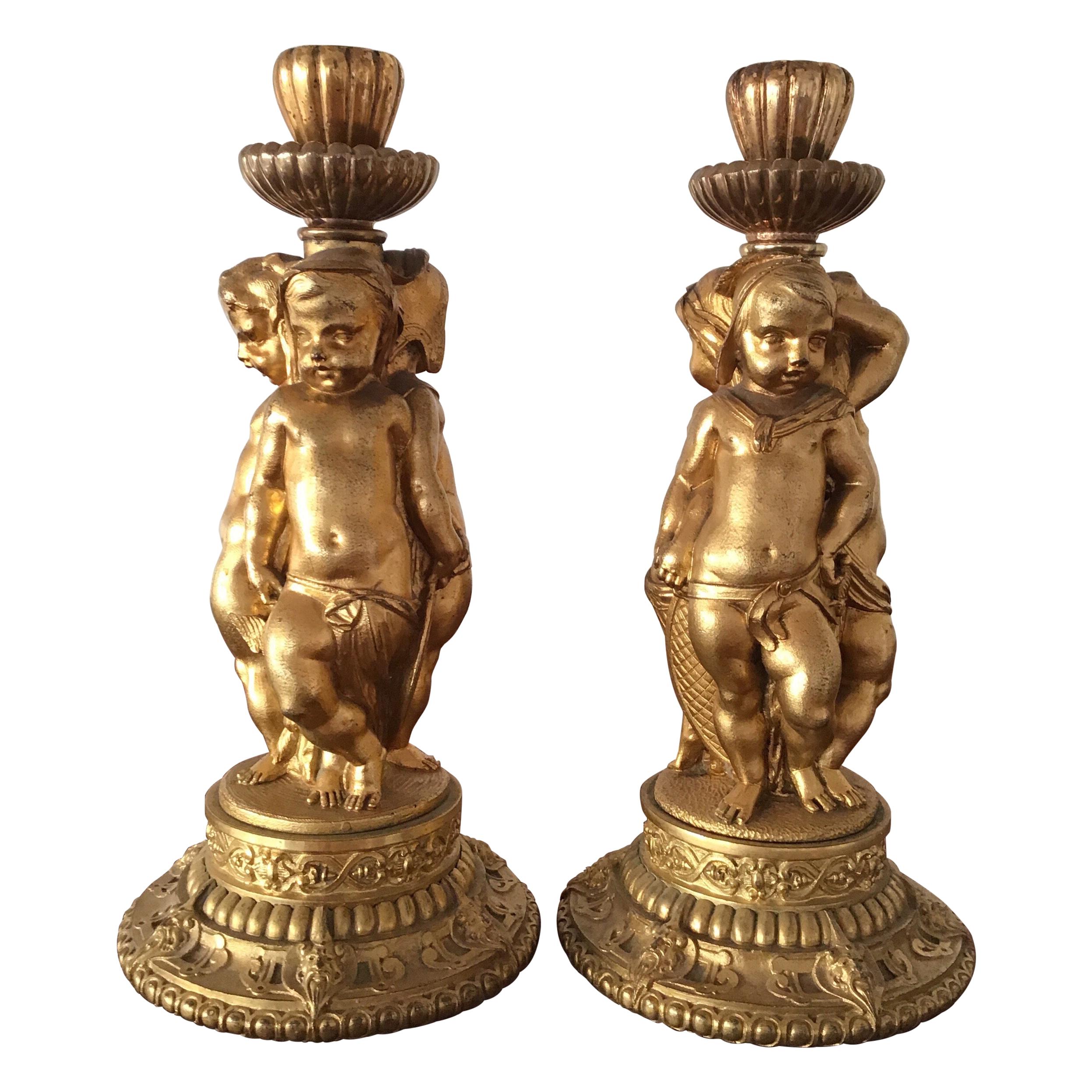 Pair of Figural Cherubs Ormolu   Candlesticks 1920's For Sale