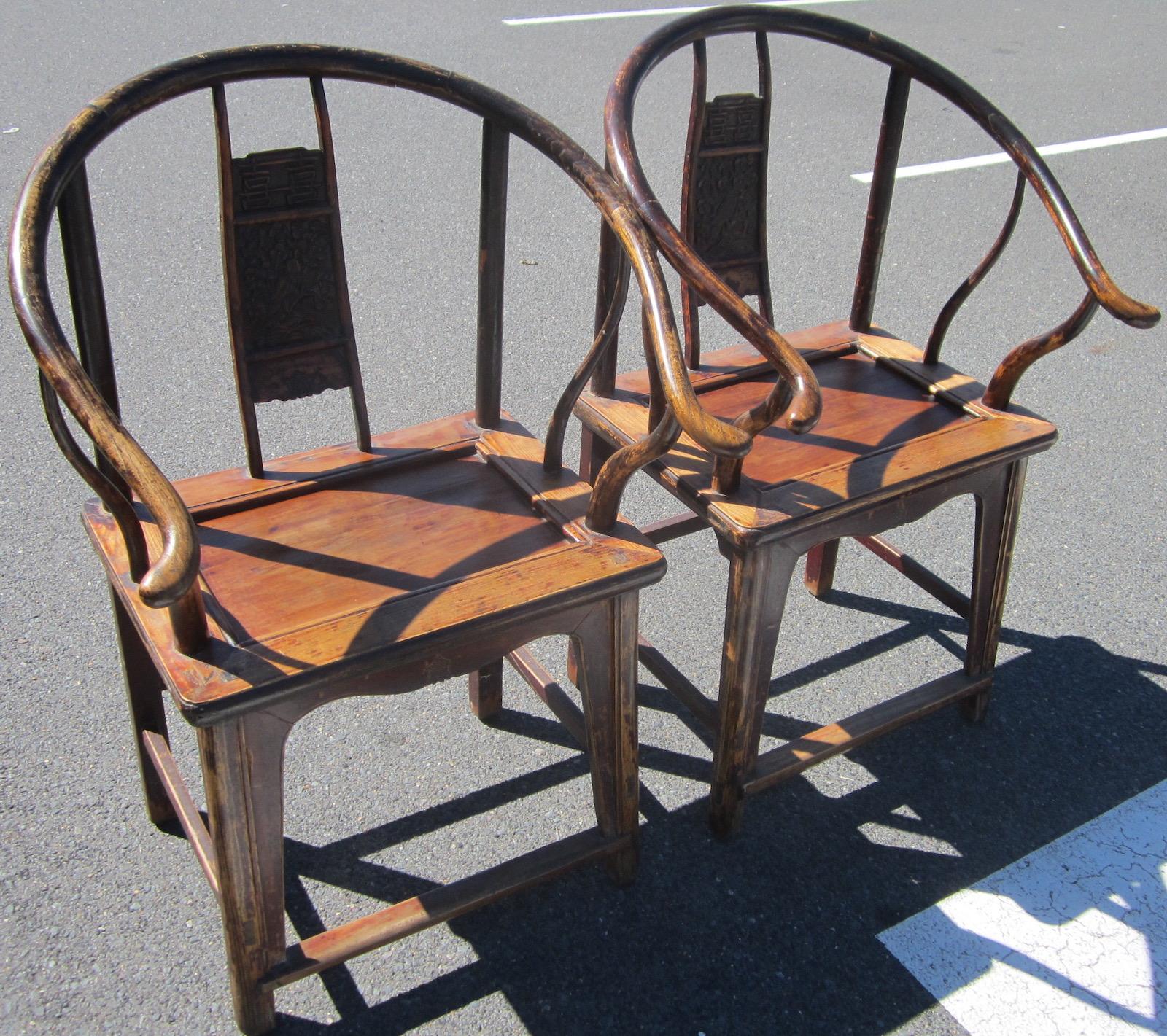 Pair of Qing style Chinese elm Horseshoe chairs, 
Measures: 66 x 57 x 102cm high, 
seat height 53cm.
Our eclectic stock crosses cultures, continents, styles and famous names.