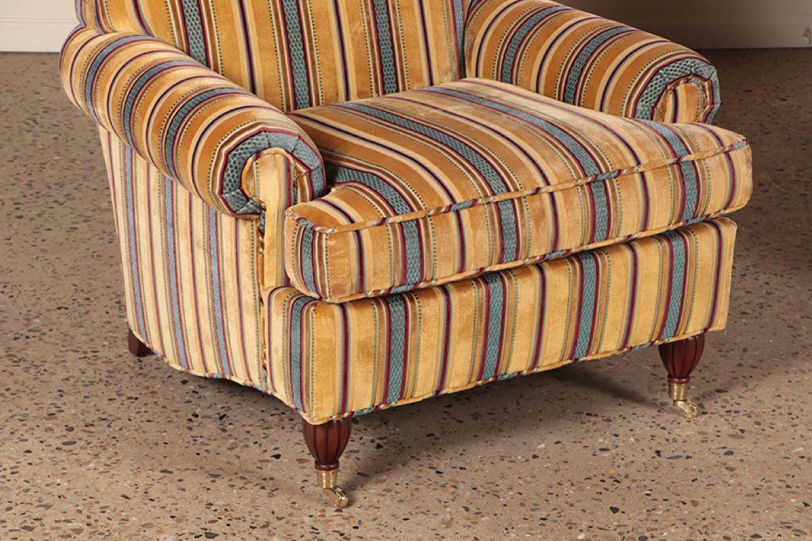 Pair quality upholstered club chairs in striped fabric having brass castors 2