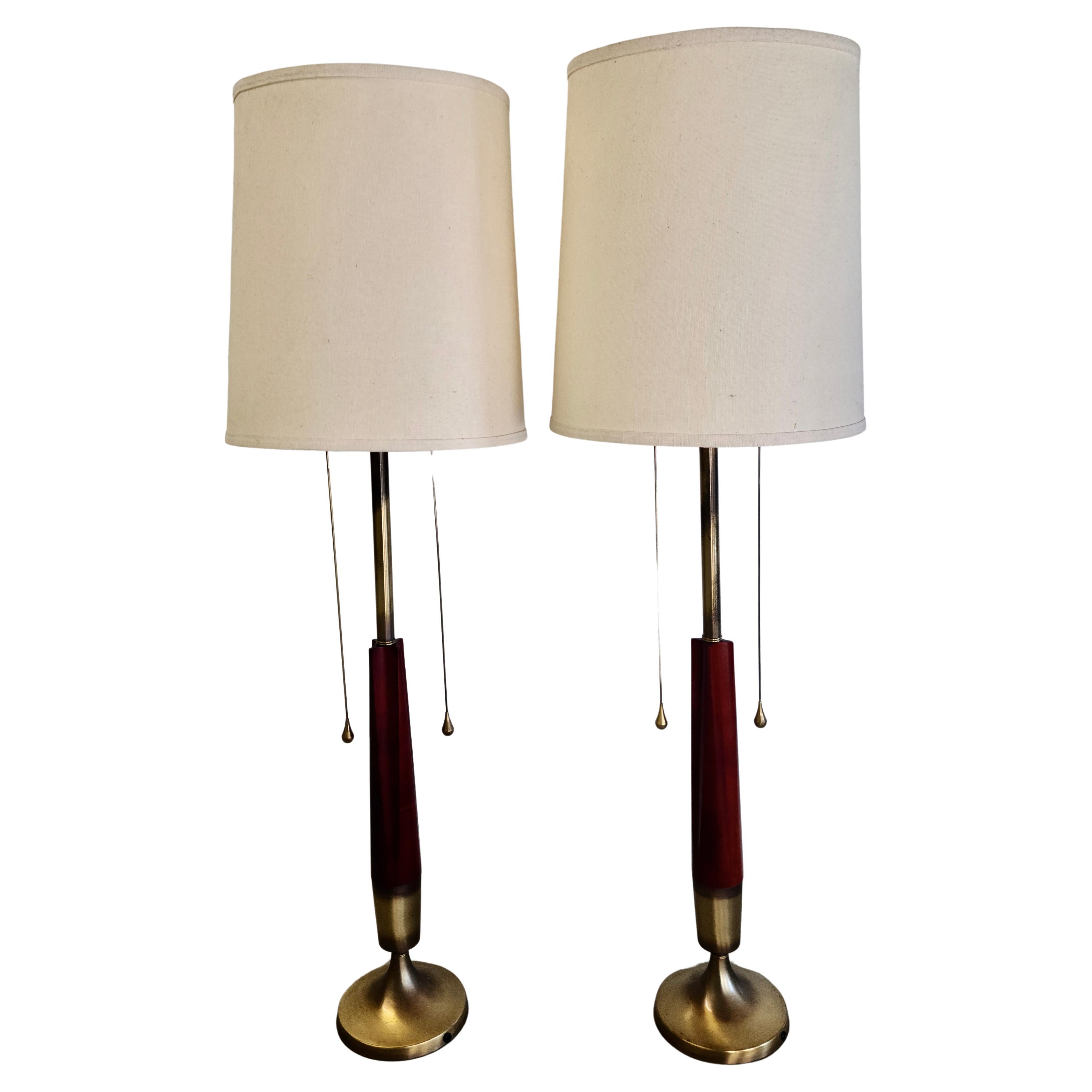 Please feel free to reach out for efficient shipping to your location.

Pair Tall Table Lamps by Westwood Lamp Company.
Sharp mid-century modern design.
Original Antique Brass Finish.
Wood Obelisks have been refinished.
Super long weighted pull