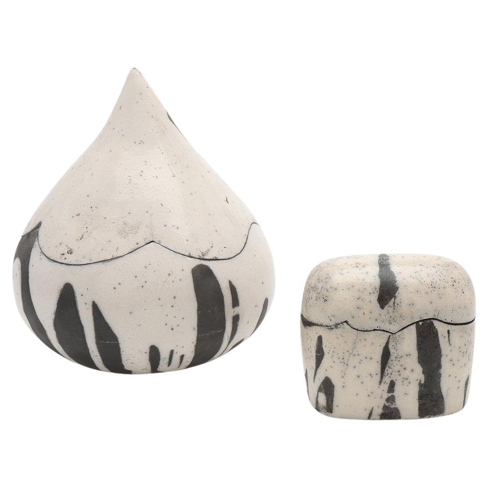 Pair Raku burnt earthenware lidded bowls by Ilja Pronk