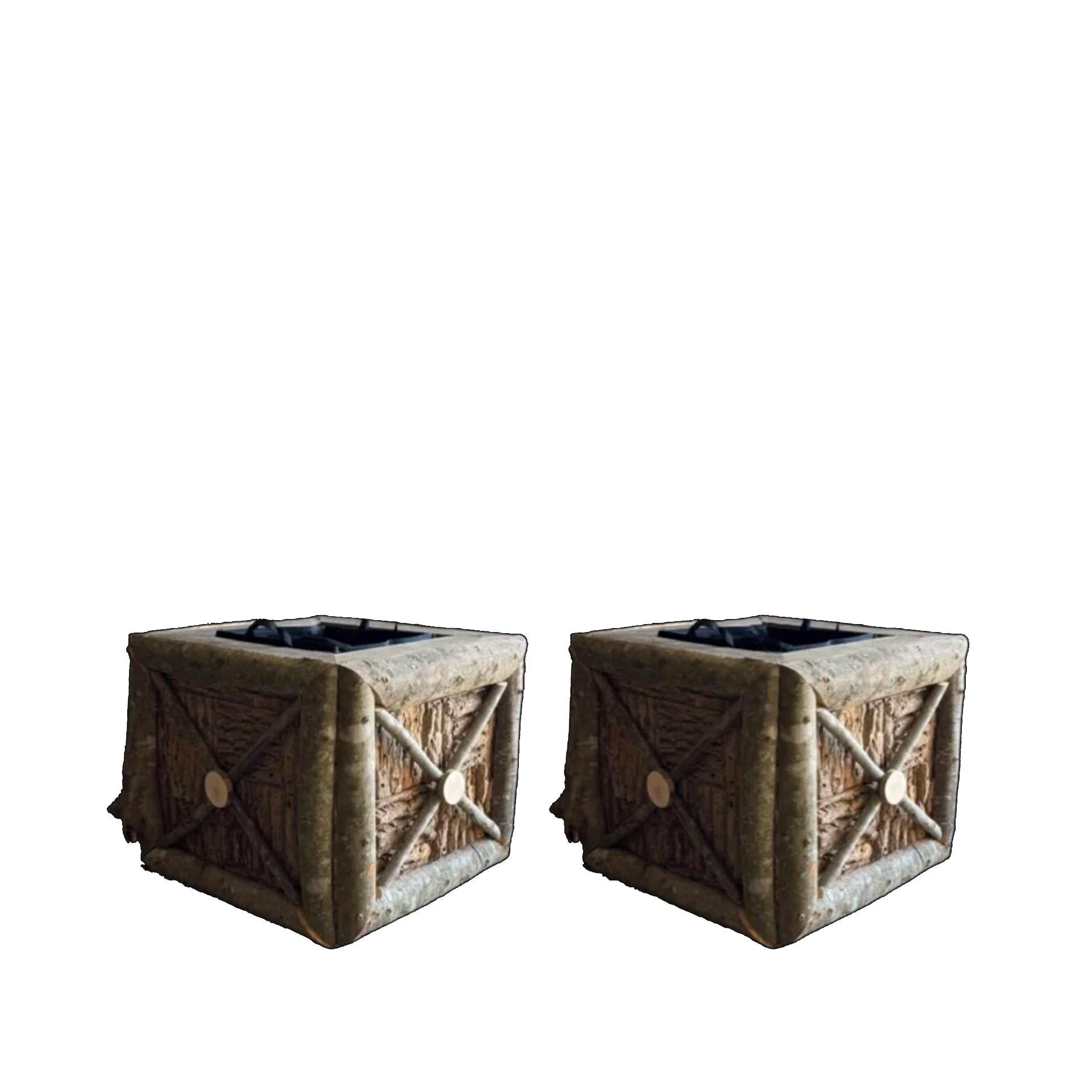 Pair of Pisgah woodland planter boxes hand-crafted by artist Raleigh Adams using kiln-dried sugar maple hardwood and poplar bark inspired by the proportional forms of classical art and architecture featuring galvanized liners and casters. 

What