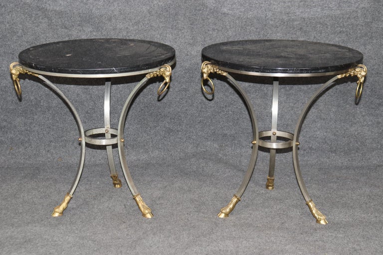 A Pair of Steel & Brass 'X' Form Marble Top Gueridons A Pair of Steel & Brass 'X' Form Marble Top Gueridons