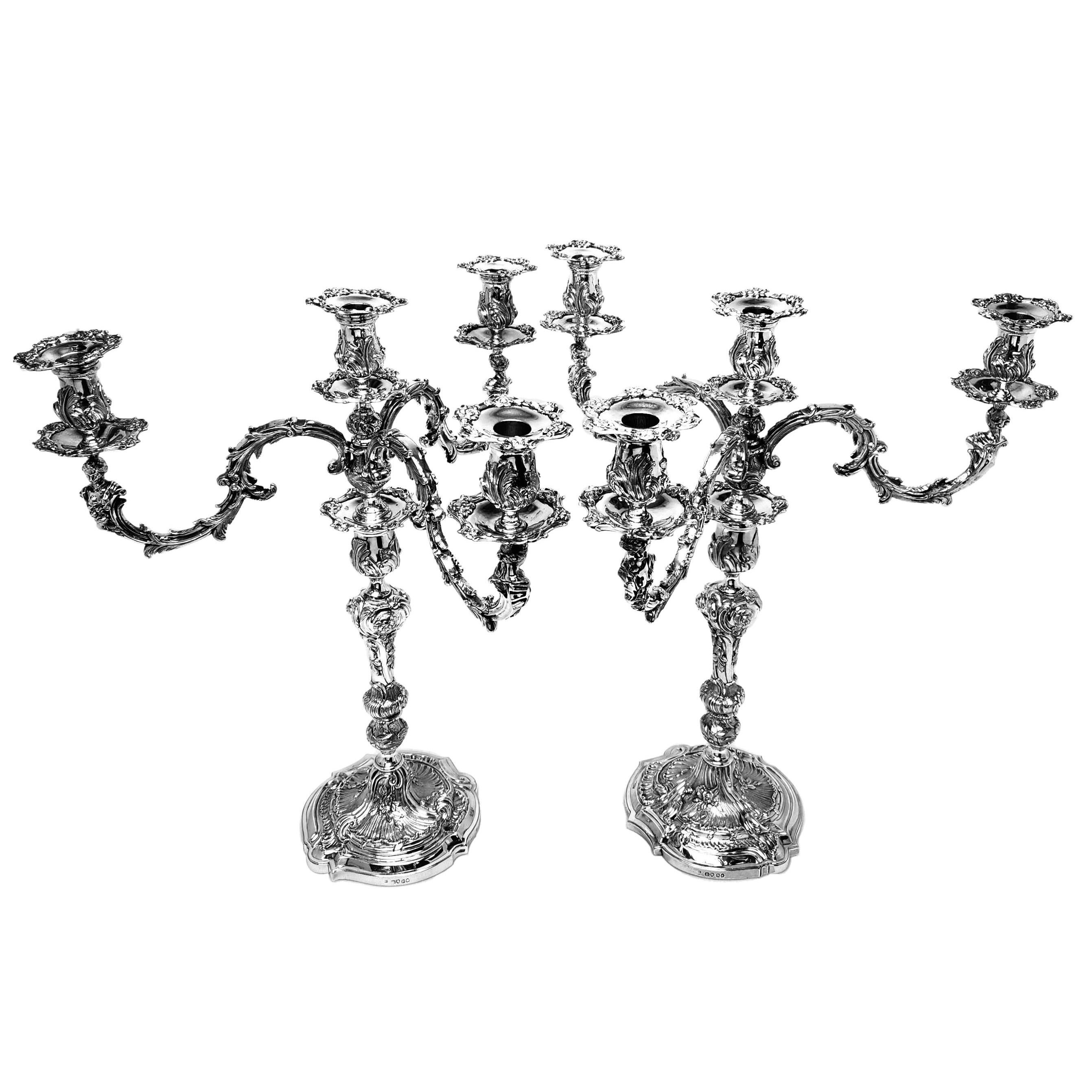A pair of magnificent Antique William IV 4 light Candelabra made in the George II Rococo Style. These Candelabra have removable Branches and are able to be converted into impressive Candlesticks. These Candle Holders are of notably large size and