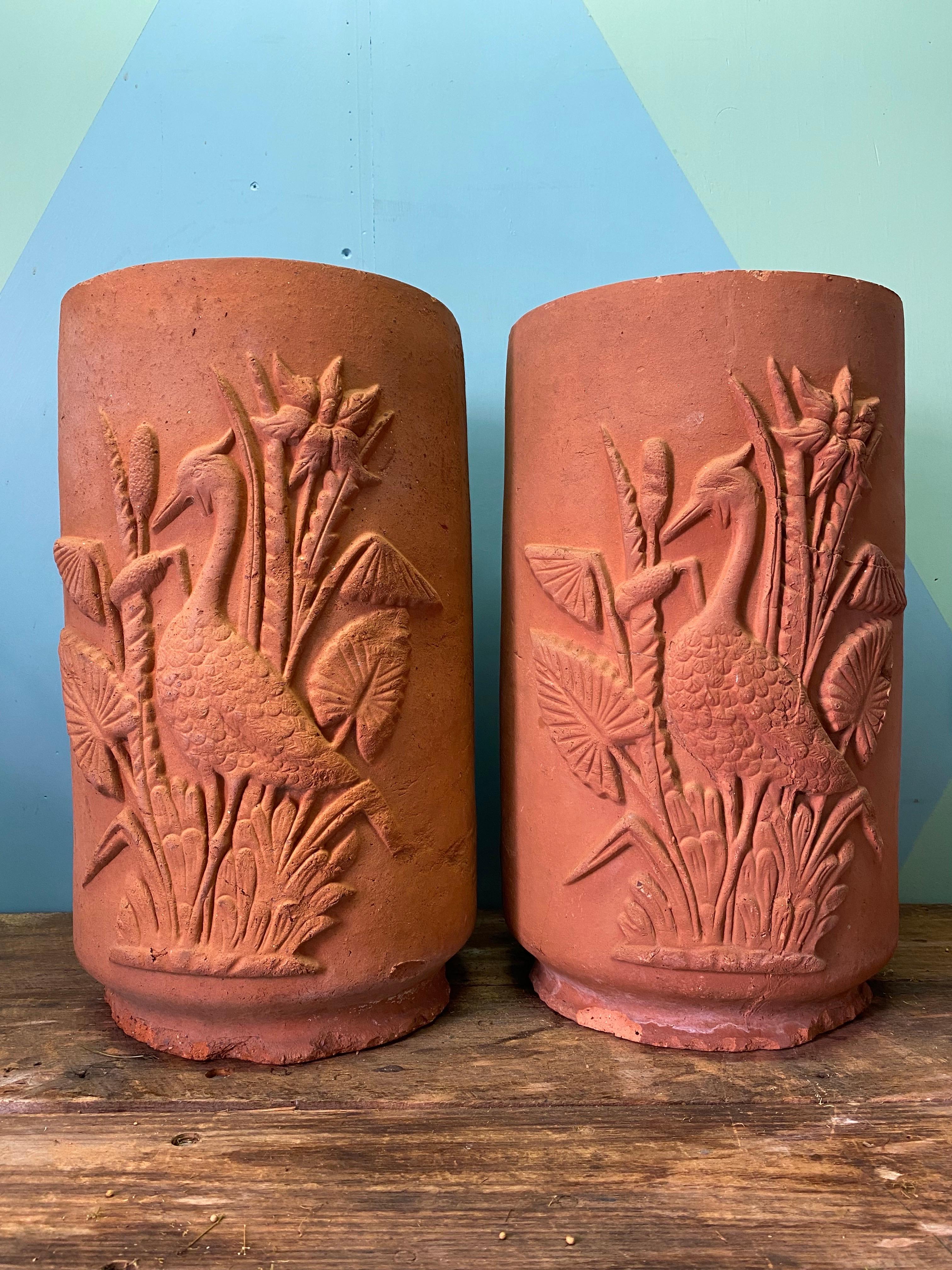 An exceptionally rare pair of John Campbell planter pots. The design is attributed to John Cambell's son, Rupert John Campbell. 

John Campbell produced decorative pots at his brick works and pottery in Launceston, Tasmania from 1880 until 1975.