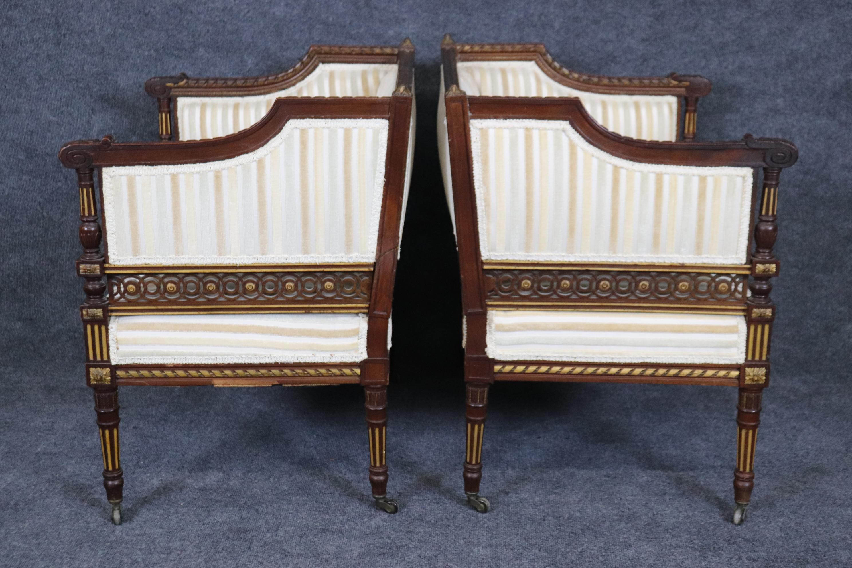 Pair Rare Precisely Carved French Louis XVI Style Gilded Walnut Bergere Chairs In Good Condition For Sale In Swedesboro, NJ