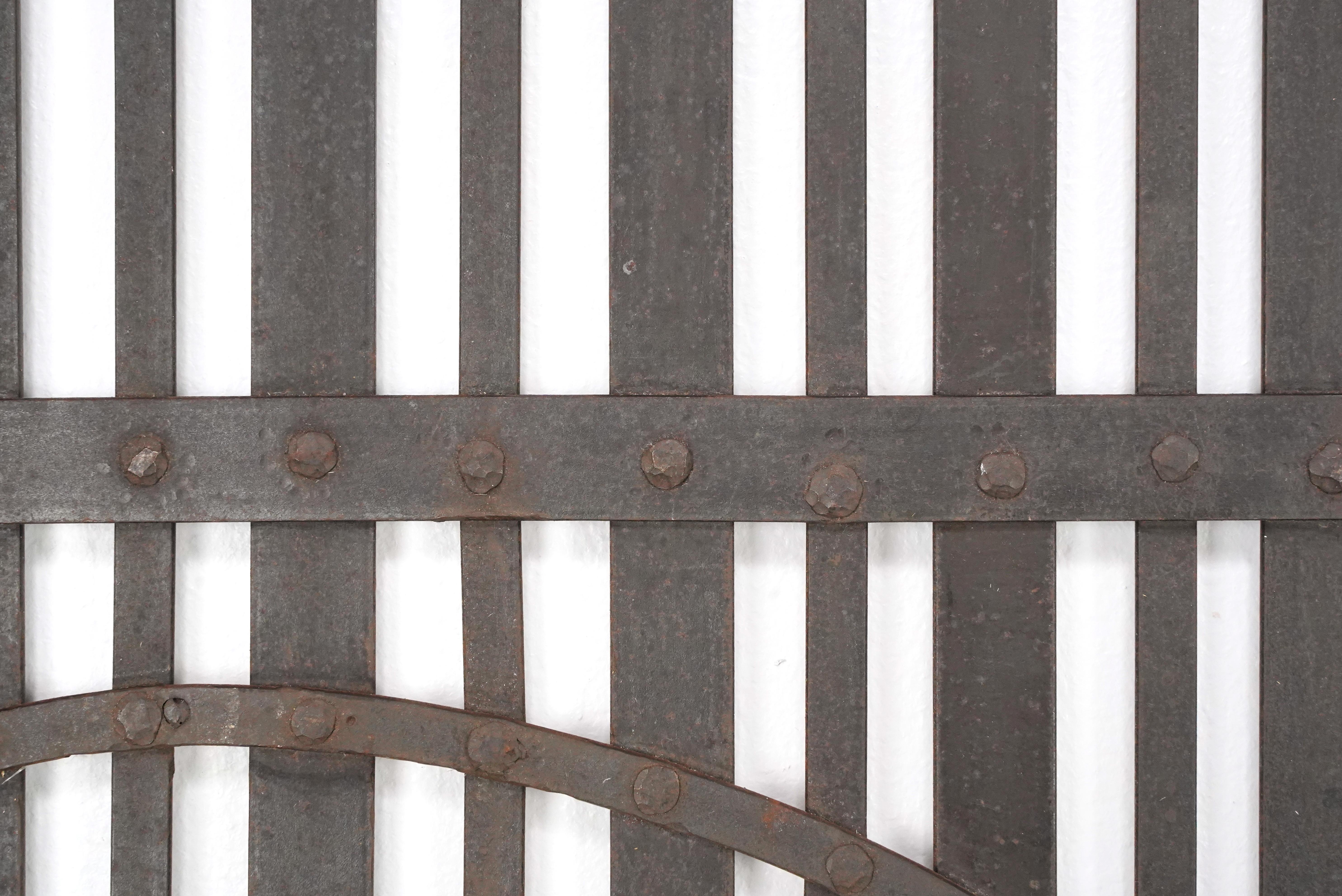 20th Century Pair Reclaimed Black Wrought Iron Arched Gates For Sale