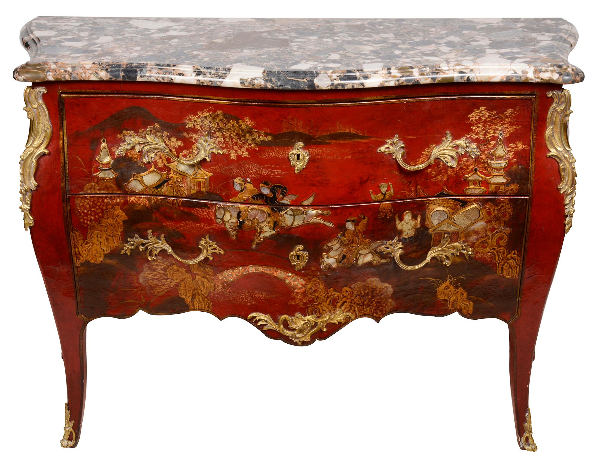 A very impressive and decorative pair of French Louis XVI style Red Chinoiserie lacquer bombe fronted commodes. Each with their original serpentine shaped marble tops, each having red ground with hand painted classical Chinoiserie decoration,