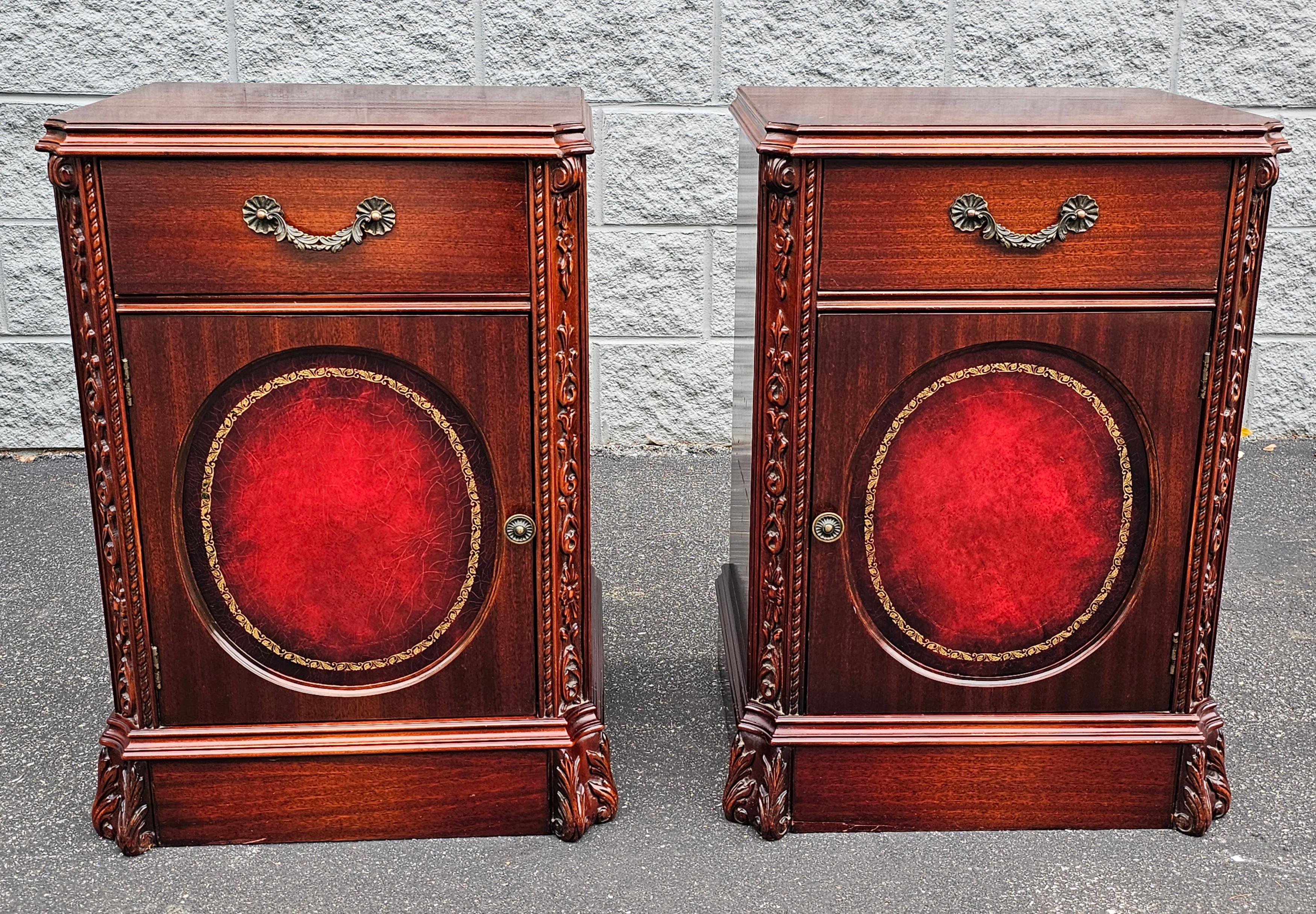 A Rare Pair of Hollywood Regency Style Mahogany and Stenciled Tooled Leather front Inset with carved corners side cabinets.
Versatile use to any room in you home or office. Measure 22