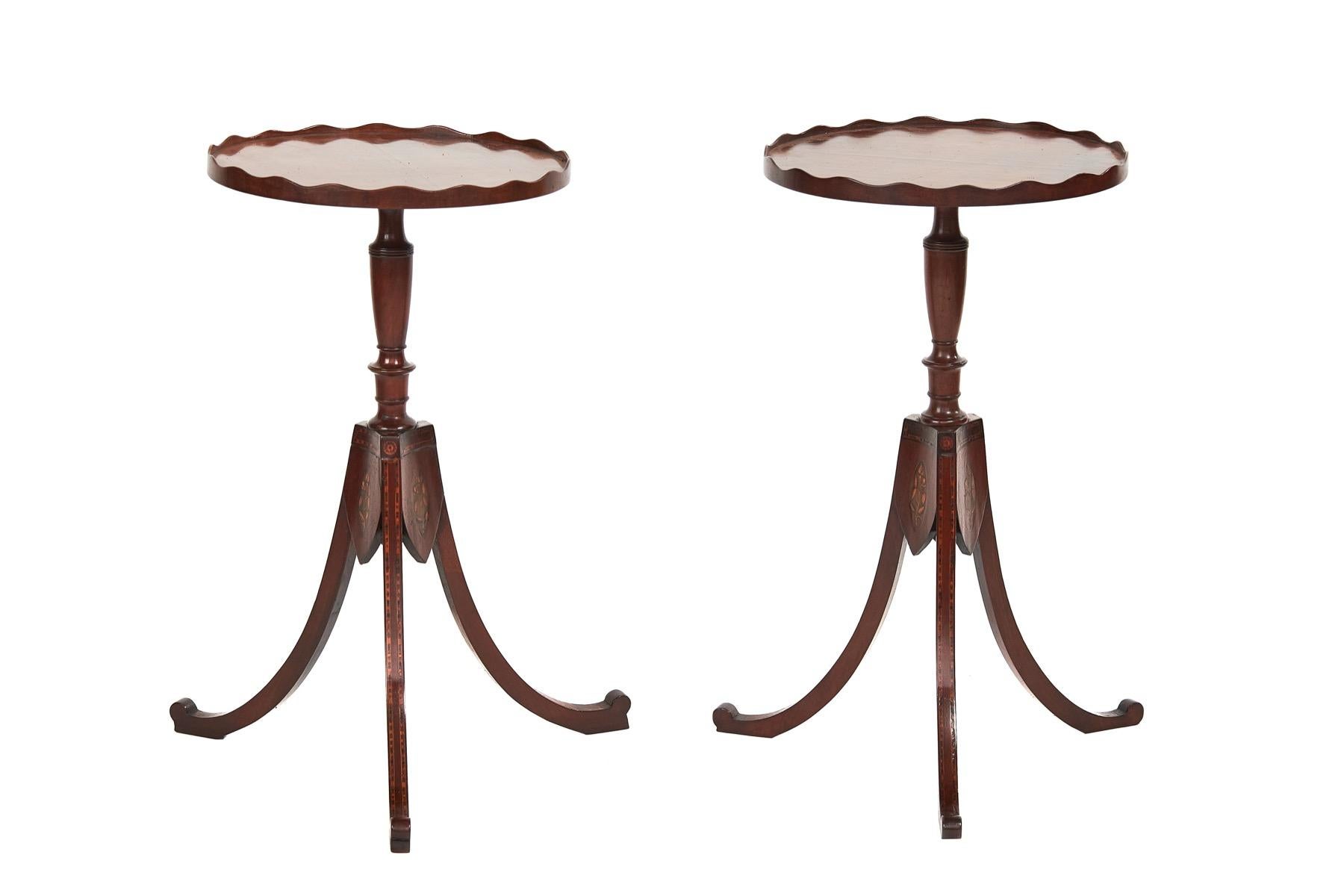Pair Regency Mahogany inlaid Lamp Tables
Each With:
Circular tops with Pie crust shaped gallery edge,Diameter:35cm
Turned Column,
Base With 3 Shields with Oval inlay, Between Tripod shaped Splay legs,
With Chequer Banding inlay on
