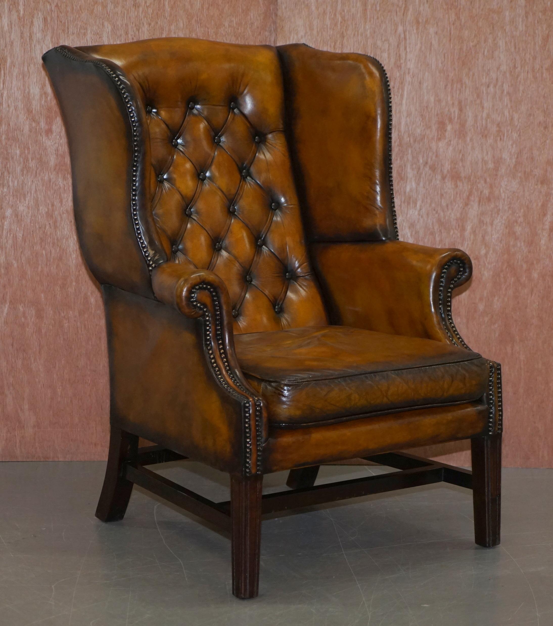 We are delighted to offer for sale this stunning pair of His & Her's Chesterfield fully restored vintage wingback armchairs in Whisky brown leather with thick heavy feather filled cushions

A good looking and comfortable pair of coil sprung