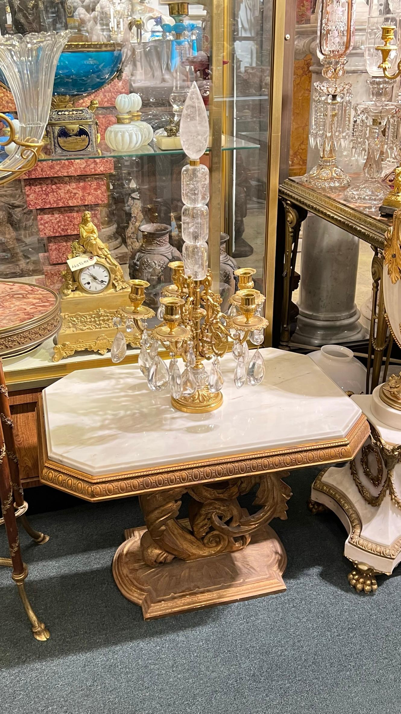 Pair of French midcentury Roccoco style Carved Giltwood Pedestal Side Tables with White Marble Tops.