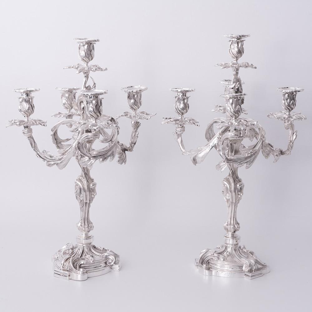 Heading : Pair Rococo Revival Silver Plate Candelabra
Date : c1880
Period : Victoria
Origin : England or possibly France
Decoration : Five light , four branches eash decorated with acanthus leaves. The bases of the screw threaded sconces with