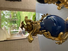Pair rococo style bronze ormolu mounted Chinese porcelain vases