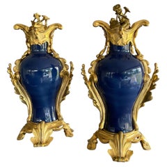 Pair rococo style bronze ormolu mounted Chinese porcelain vases