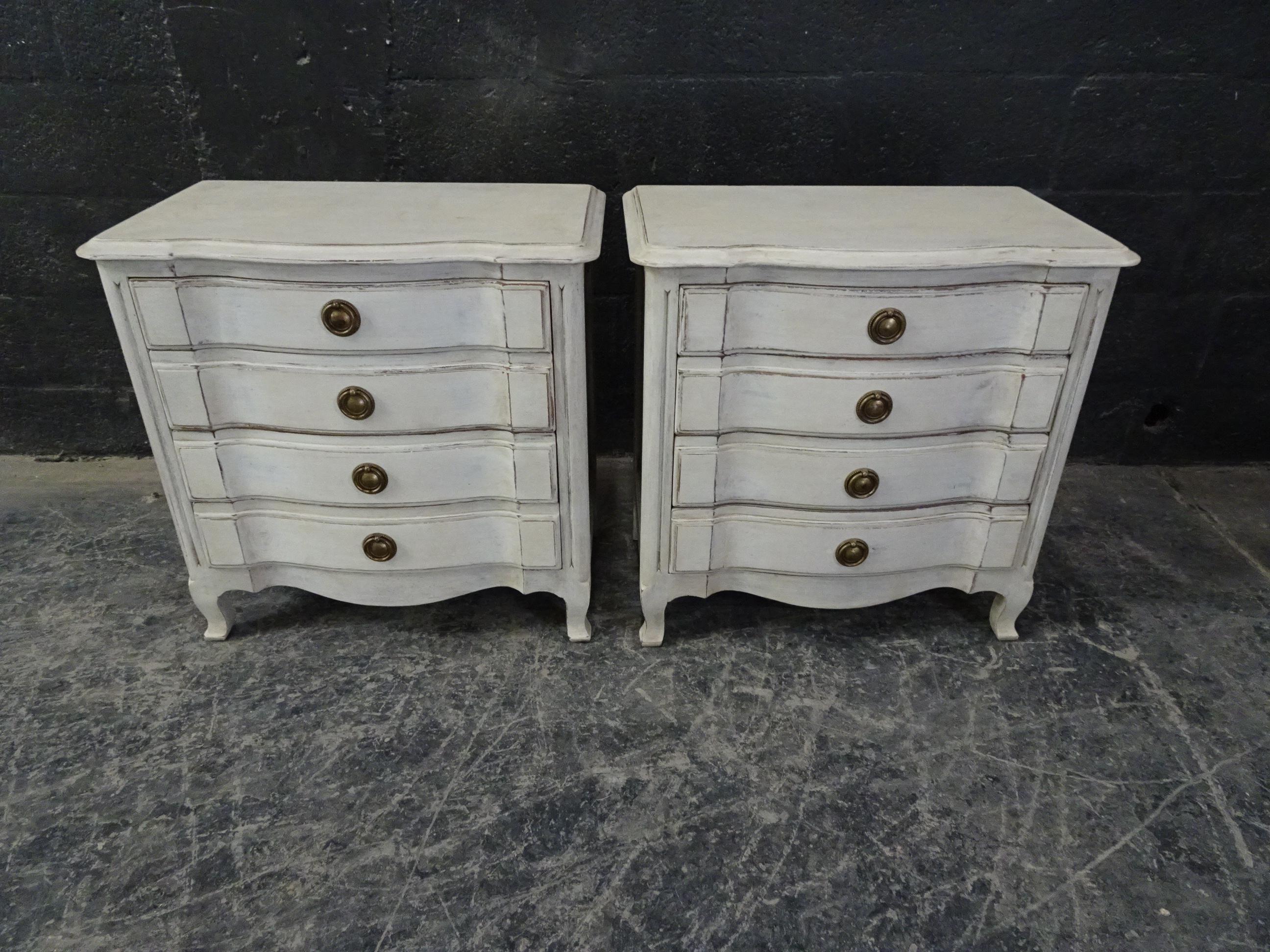 This is a pair of Rococo style nightstands, They have been restored and repainted with milk paints 