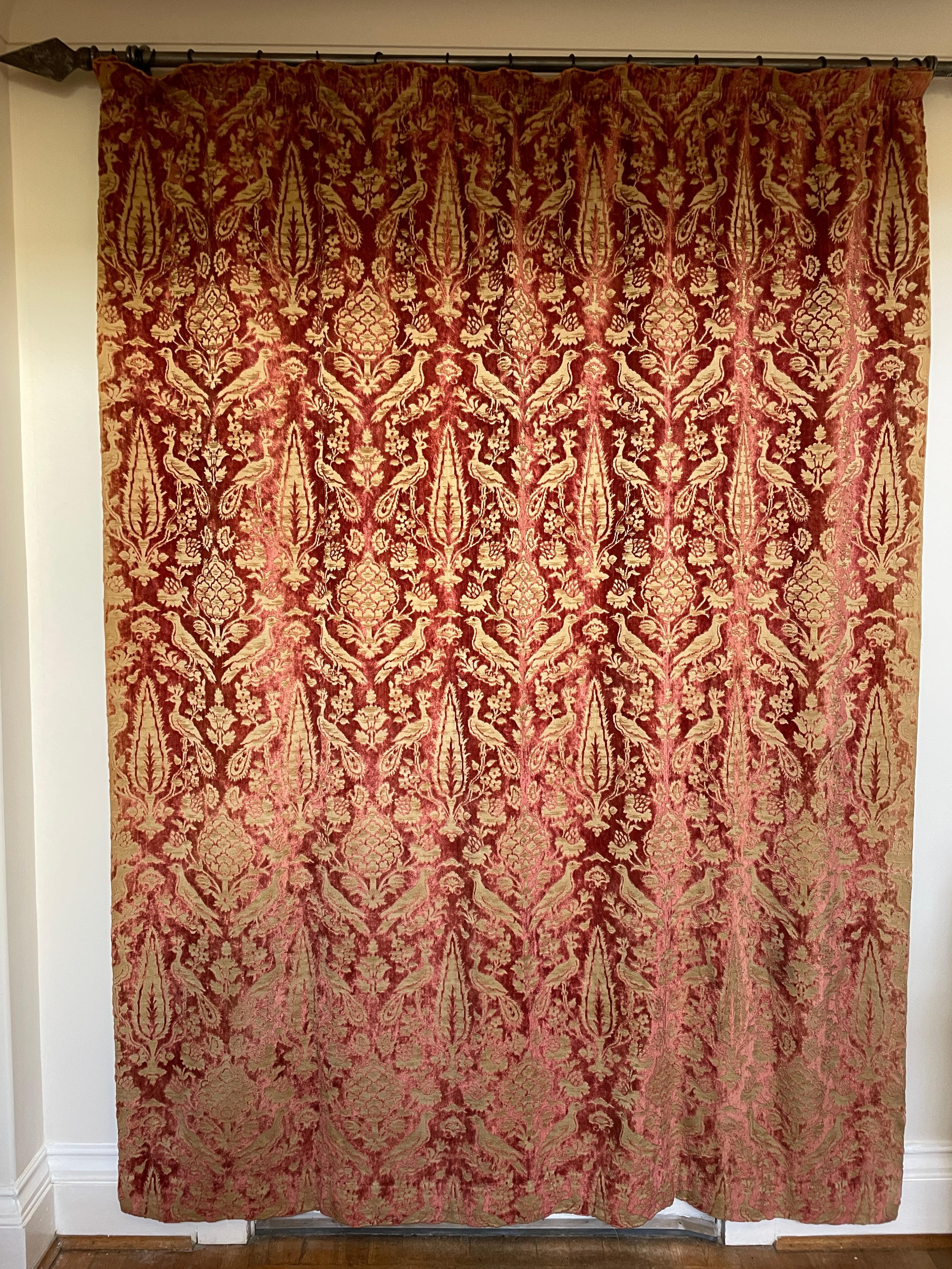 The pattern depicting a pair of love birds either side of a stylised artichoke and a pair of peacocks flanked by a pair of cypress trees.

Generous hem, not lined.

Each Curtain
Height 220m, Length 170cm
Pattern Height 49cm
Pattern Length 31cm