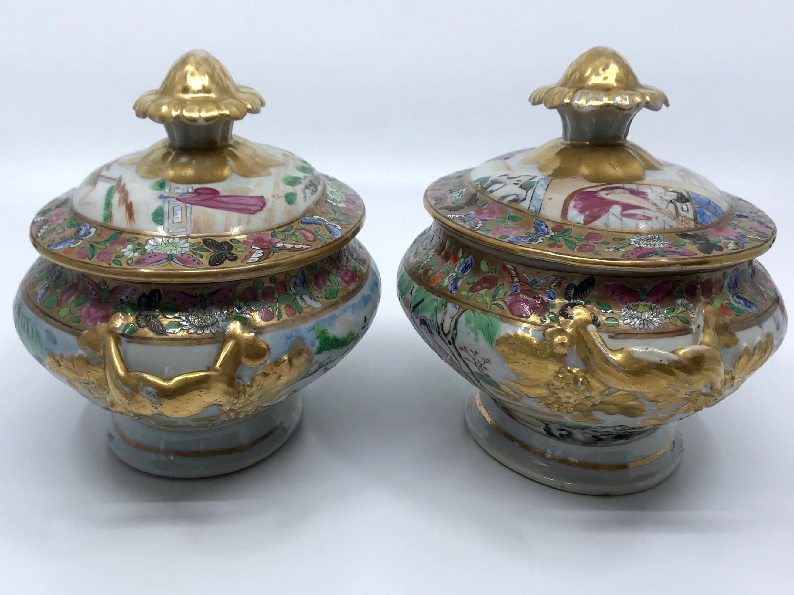 Pair of rose Mandarin Chinese porcelain sauce tureens. Vibrantly hued and gilt painted Chinese Export covered dishes with large gilt floral knopfs on the lids. China, late 19th century
Dimensions: 7.75