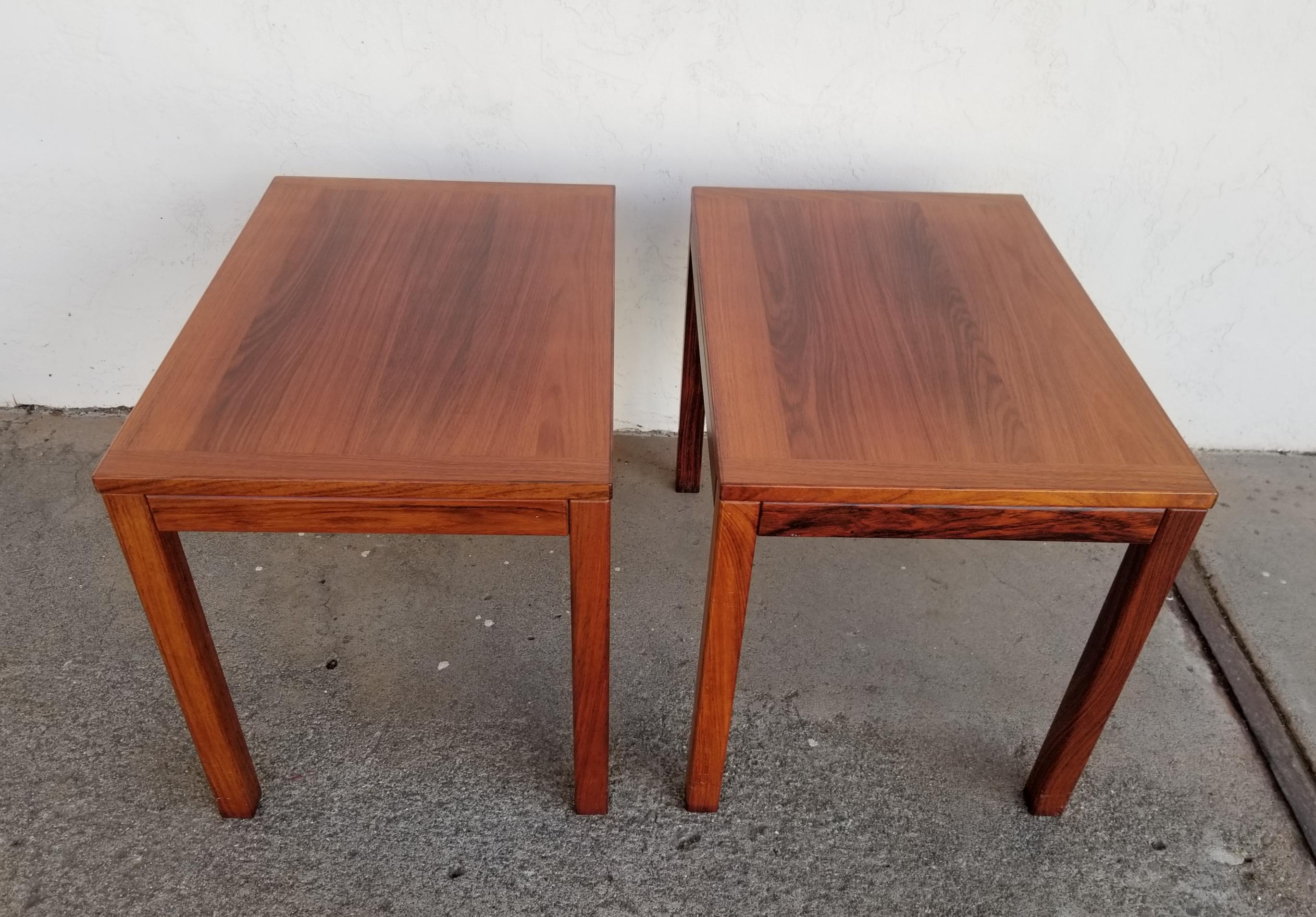 Rectangular side tables by Vejle Stole, Denmark. Crafted with beautiful grain, solid rosewood legs and apron. Very good original condition and original finish. Each table branded with makers mark. 1970's.