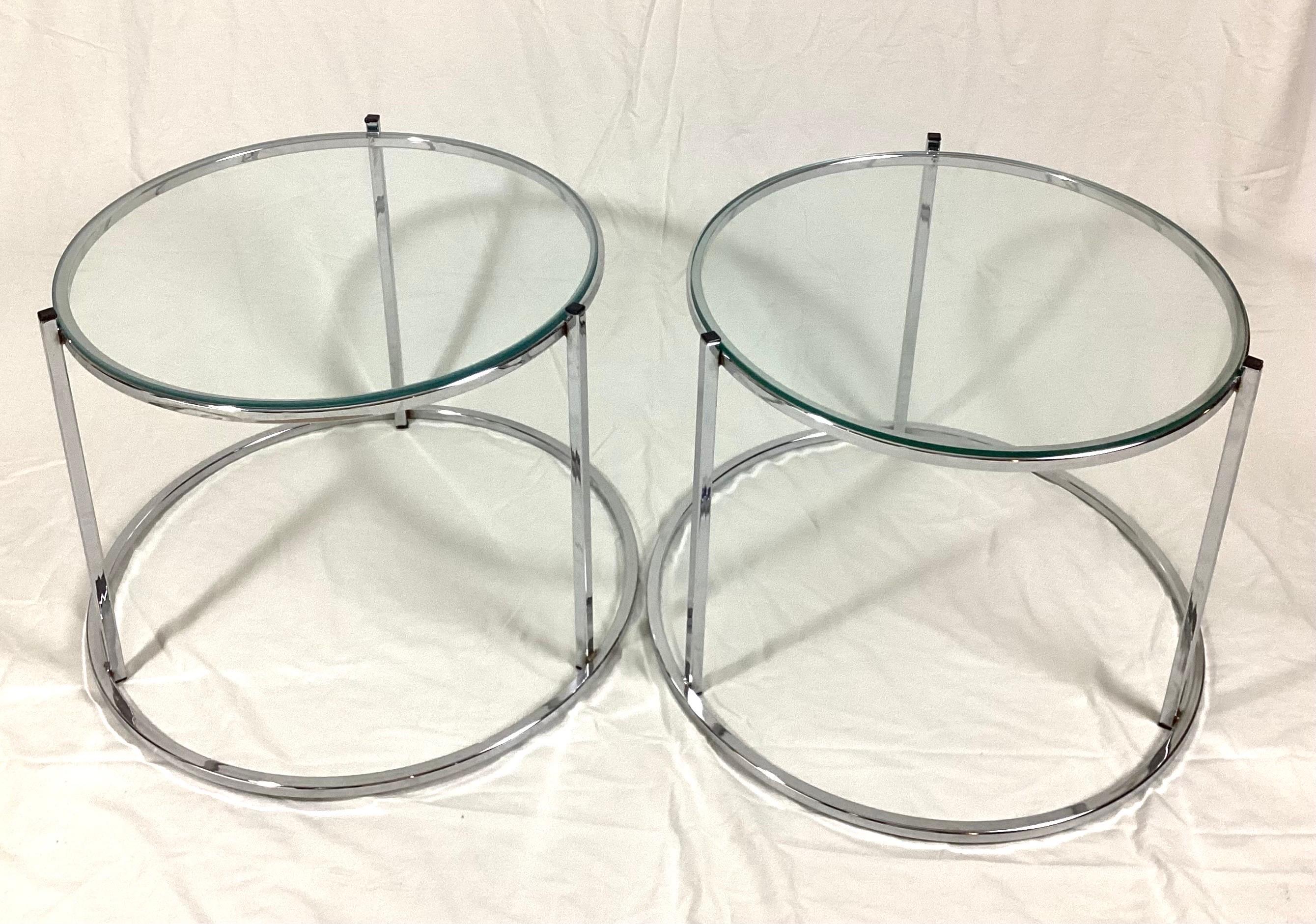 Pair Round Chrome and glass drink side tables. These table are un-marked. Great size, only 18 1/2