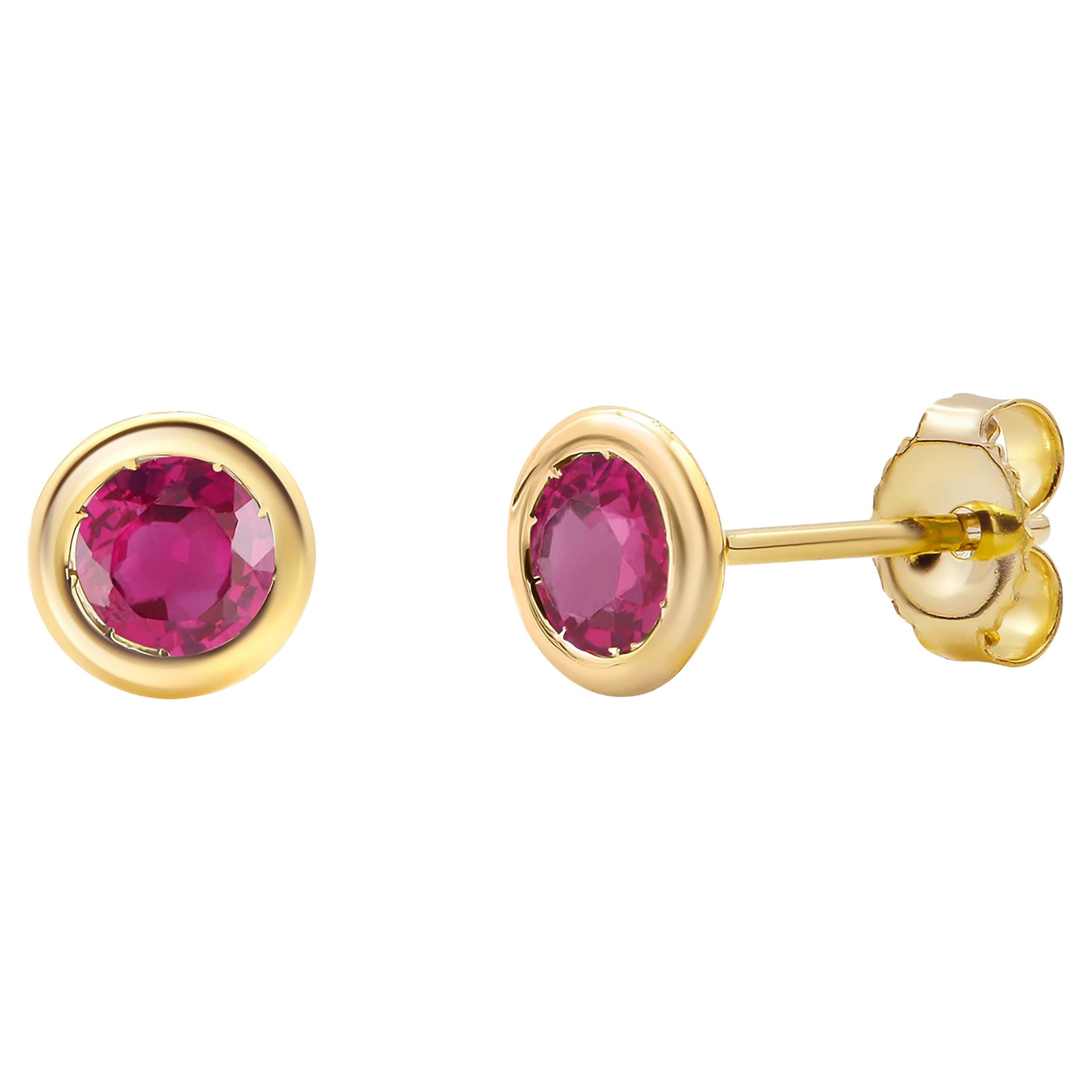 Pair Round Ruby 0.60 Carat Bezel Set Yellow Gold 0.23 Inch Stud Earrings For Sale