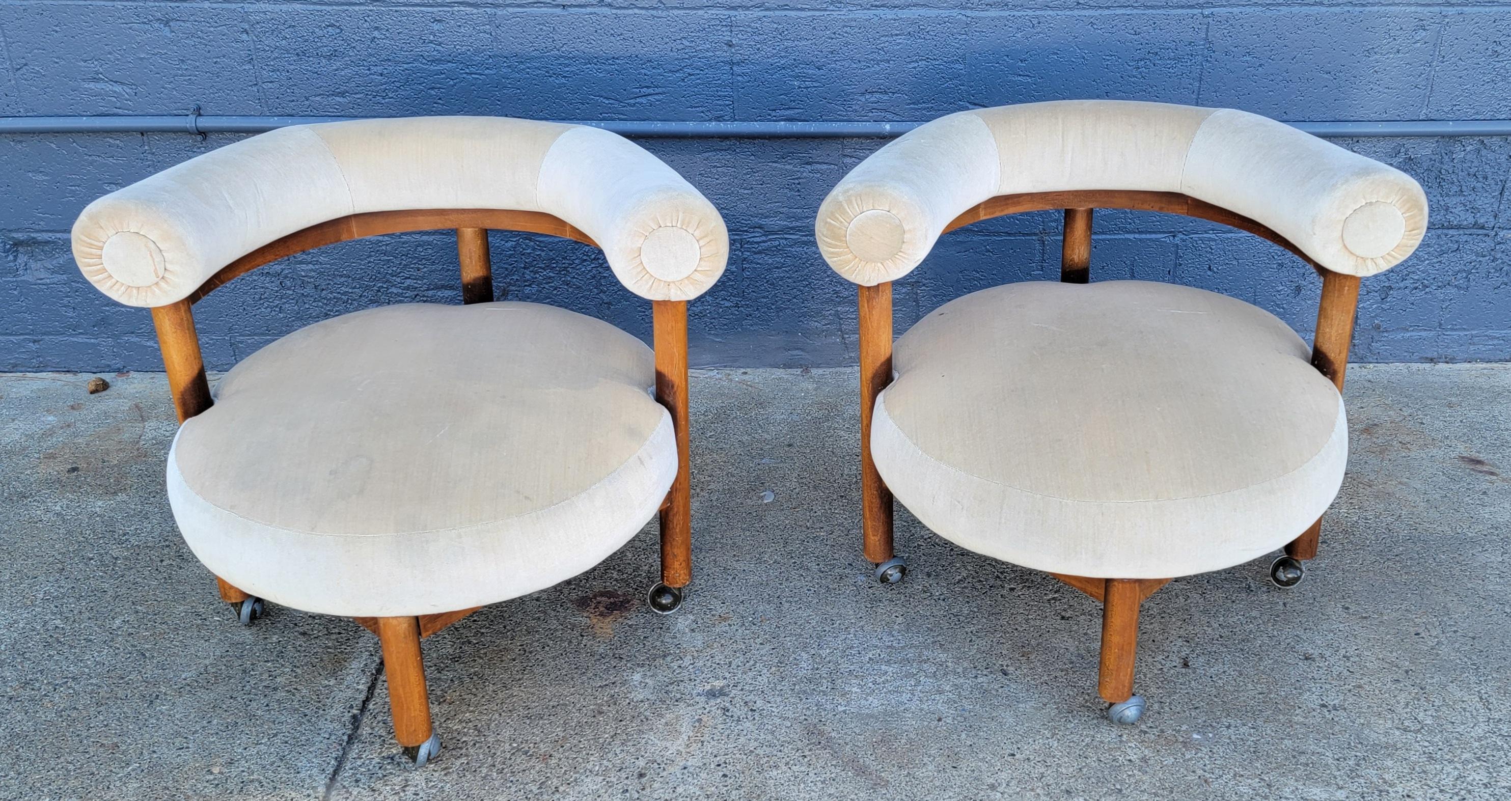 An unusual and impressive pair of round lounge chairs with a semi-circular backrest. Circa. 1960's. Designed in the manner of Adrian Pearsall, Sven Ellekaer or the Nanna Ditzel 
