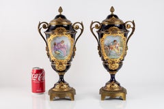 Pair Royal Blue Sevres Porcelain & Bronze Mounted covered Vases w/ Watteau scene