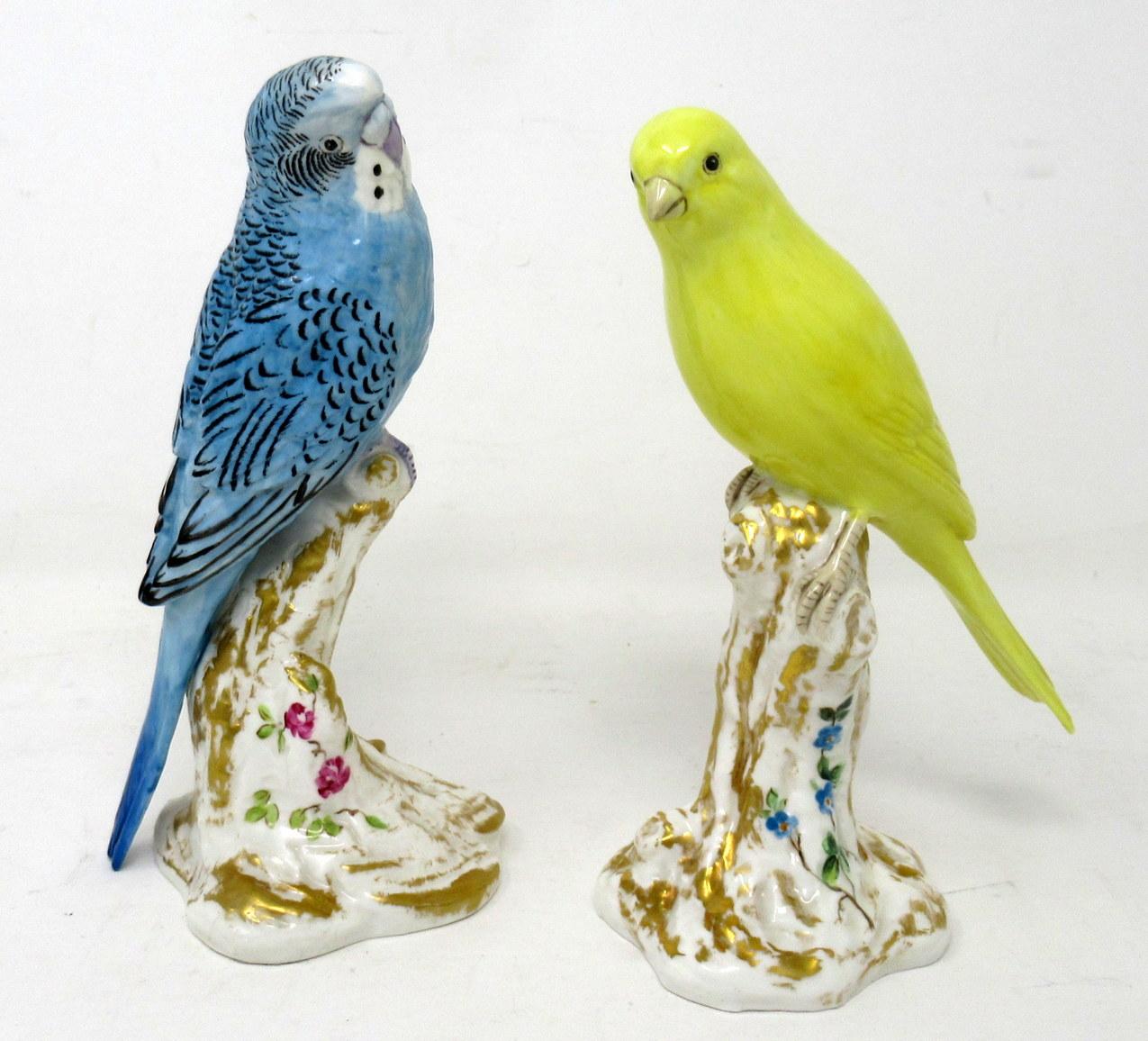 Very Stylish Pair of Glazed English Porcelain Royal Worcester Bird Figures modelled as a Canary and a Budgerigar. Circa 1950. Modelled by early Twentieth Century Worcester Artist Frederick M. Gertner. 

Each naturalistically modelled and perched