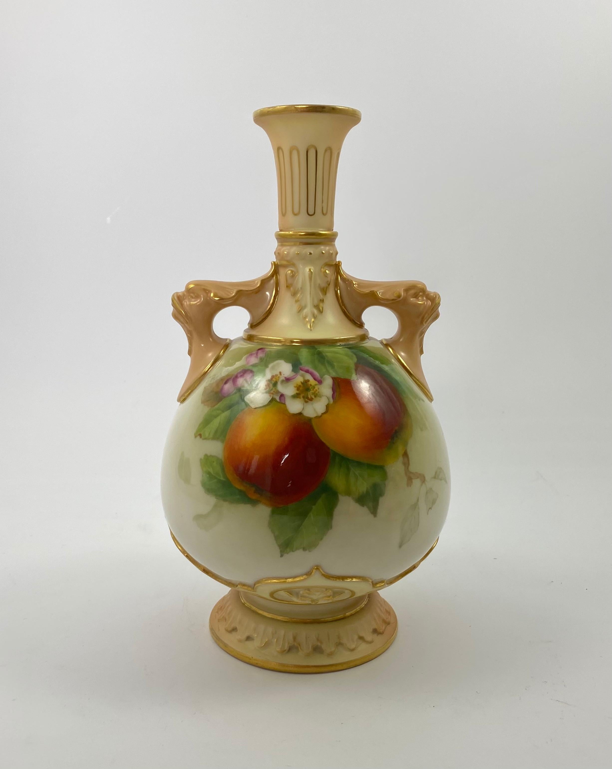 Fine pair of Royal Worcester porcelain vases, painted by F. Parker, dated 1906. The vases painted with studies of apples and pears, with sprigs of blossom to the reverses. Both vases having mythical beast handles, and acanthus leaf moulded necks,