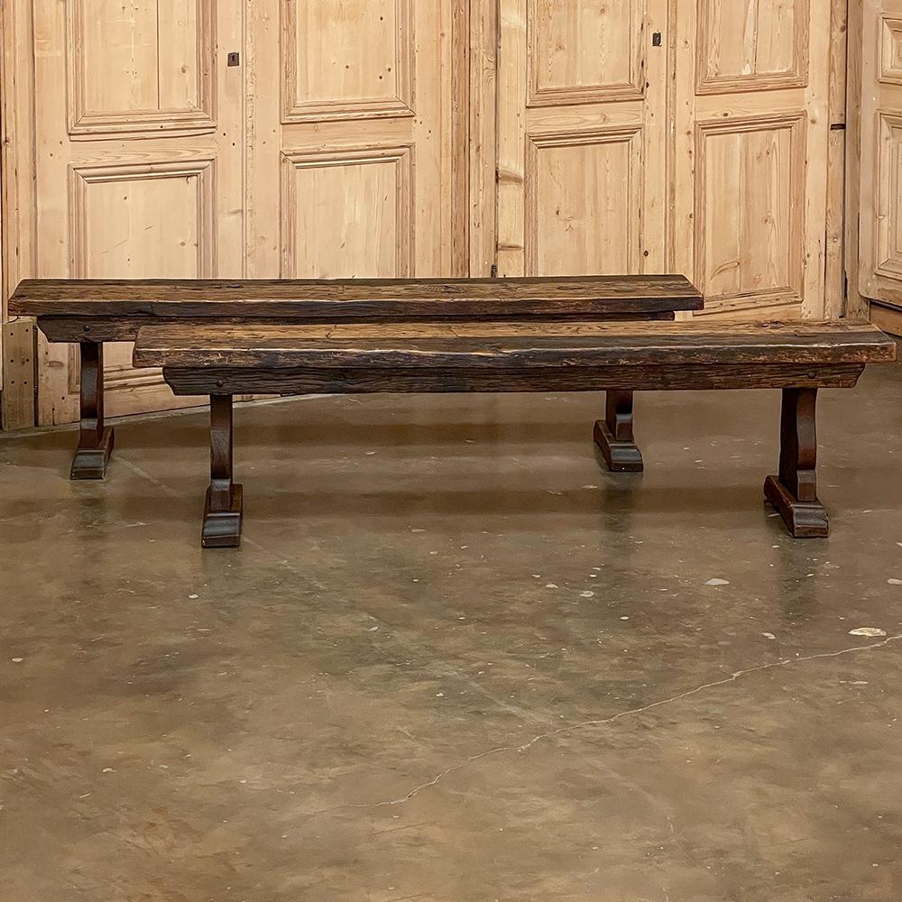 Pair rustic Dutch oak benches are the ideal choice for any casual decor, and can literally fit most anywhere! Perfect for placement between a breakfast table and a panoramic window, they provide seating when needed without obstructing the view.