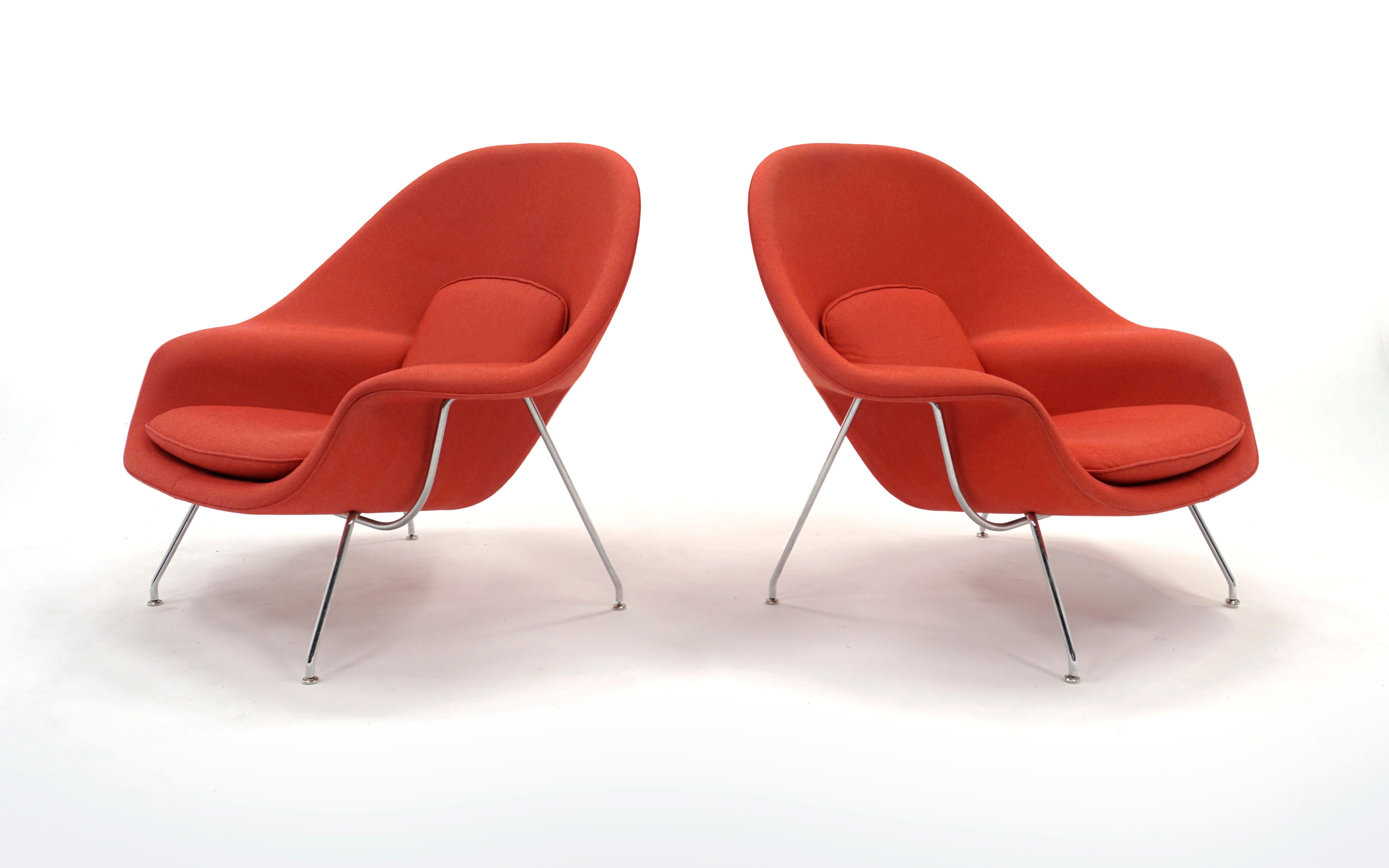 Two matching Womb chairs designed by Eero Saarinen, manufactured by Knoll. Price is for each. Completely original, only five years old. The chrome looks like new and the fabric has no tears or wear. There are a few tiny black spots (likely ink) that
