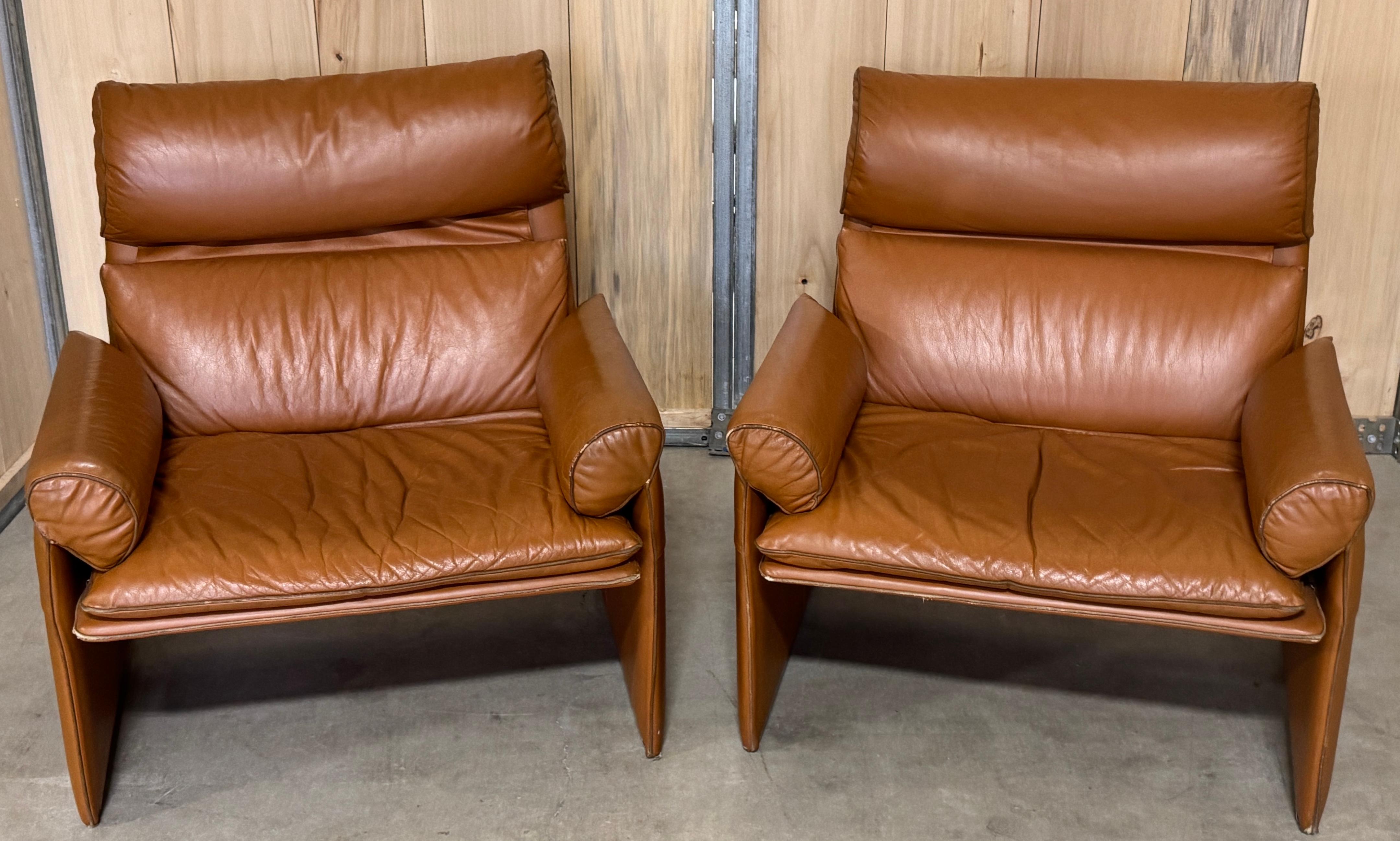 Pair of Saddle Brown Leather Lounge Chairs by Giovanni Offredi for Saporiti, Italy, 1970s

This beautiful pair of saddle brown leather lounge chairs, designed by Giovanni Offredi for Saporiti Italia in the 1970s, embodies the refined elegance and