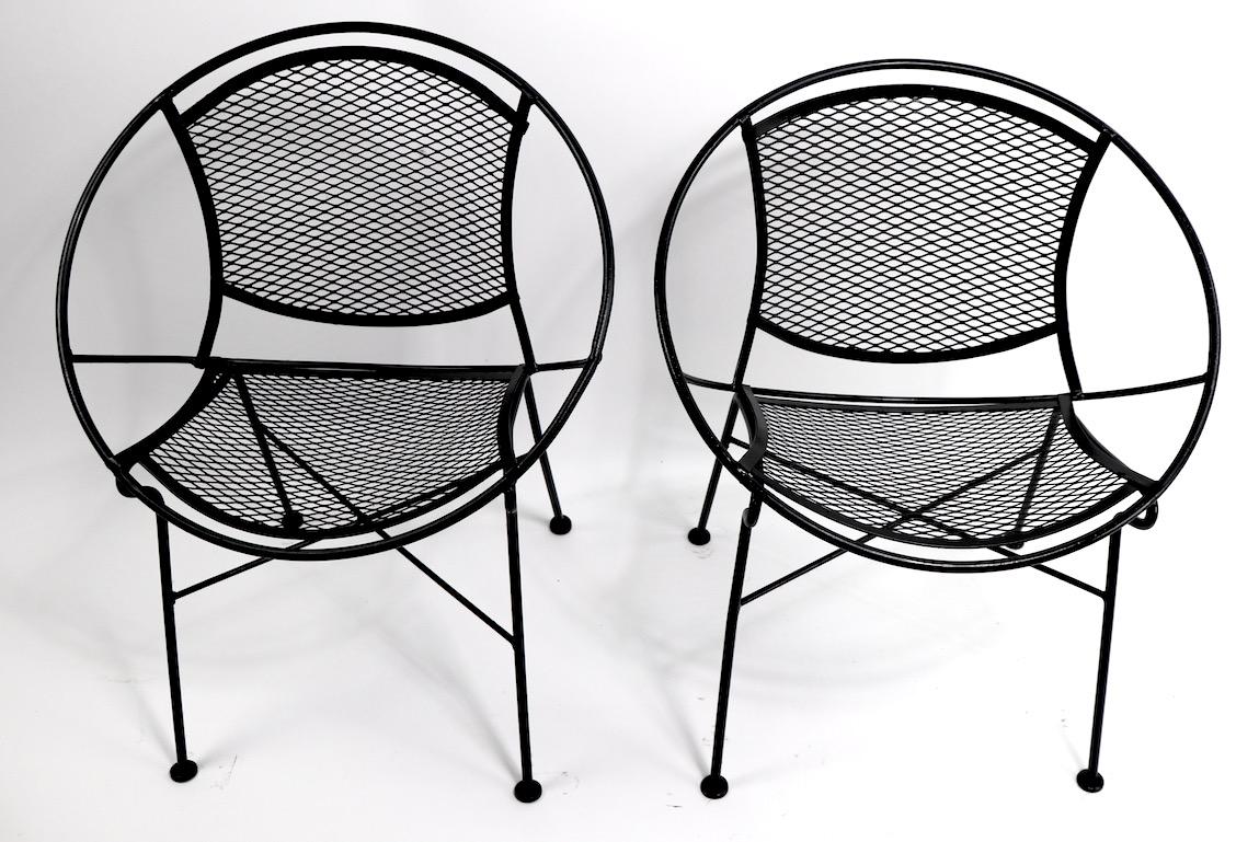 Two radar lounge chairs by Salterini, both in very good condition, both freshly painted in black paint finish. Offered and priced individually, but we would love to see them stay together.