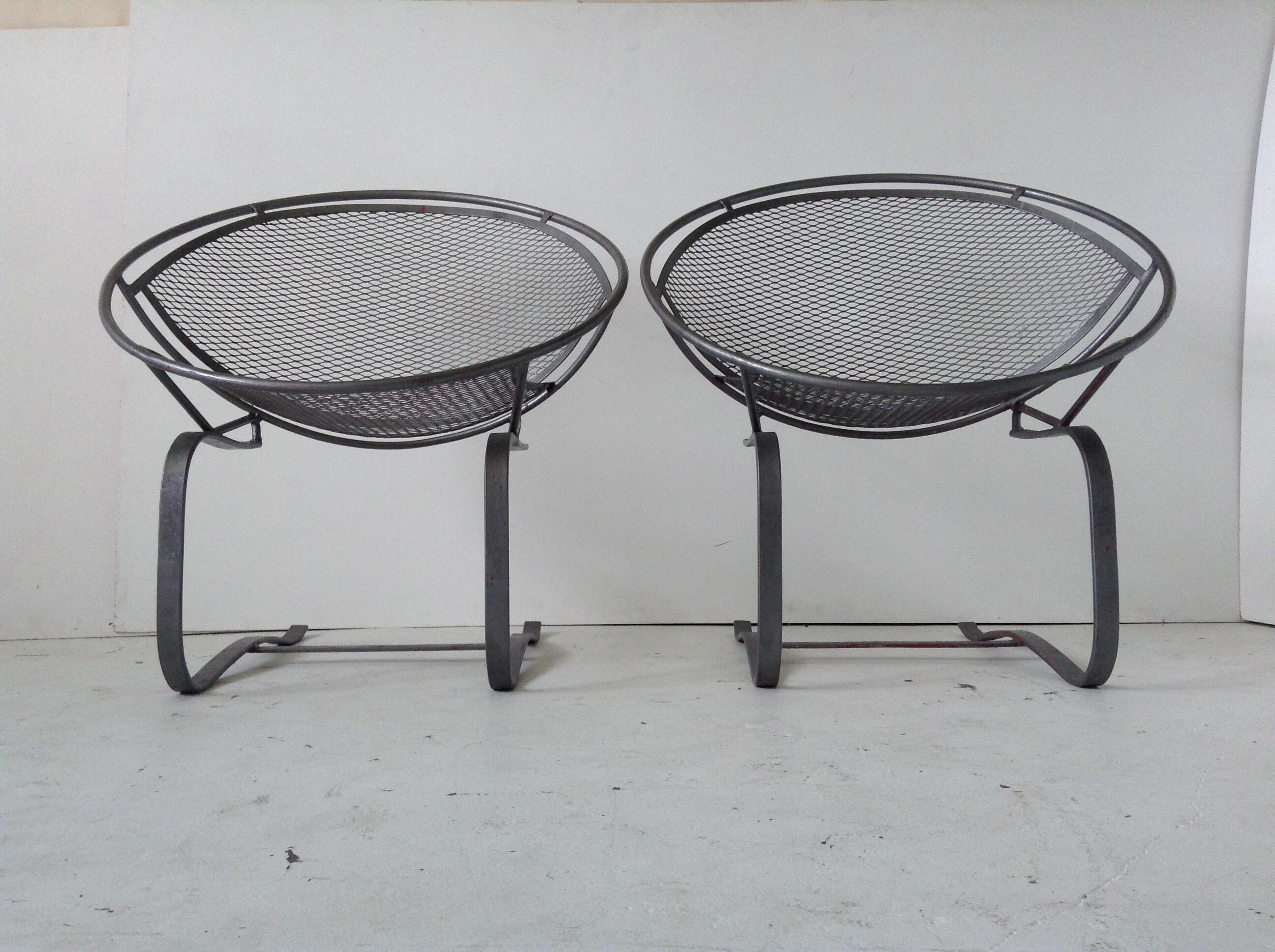 This is a nice looking set of original Woodard Salterini radar iron lounge chairs. These have the Springer base so you can rock in them for added comfort! They are vintage 1960s. They have been painted but used with some paint loss.