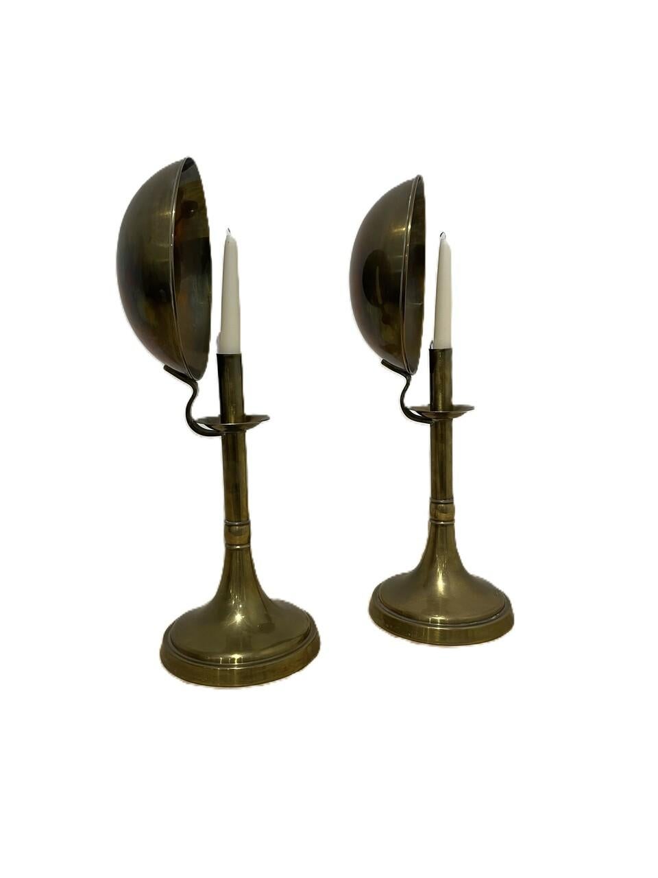 Pair Sarreid Brass Candle holders with Concave Reflectors. Could be polished if the natural patina isn't the look you are after.