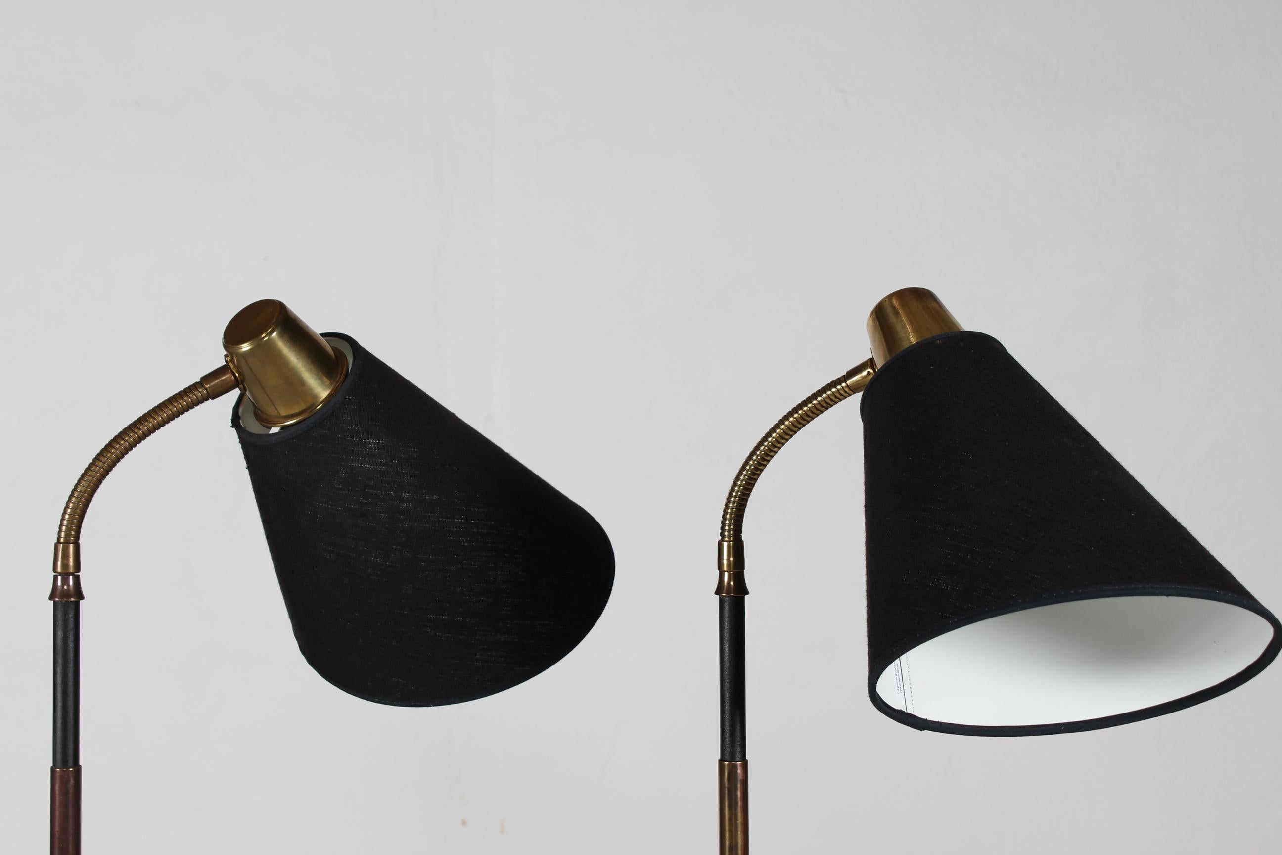 Scandinavian Modern Pair Scandinavian Adjustable Floor Lamps Black Lacquer and Brass 1940s For Sale