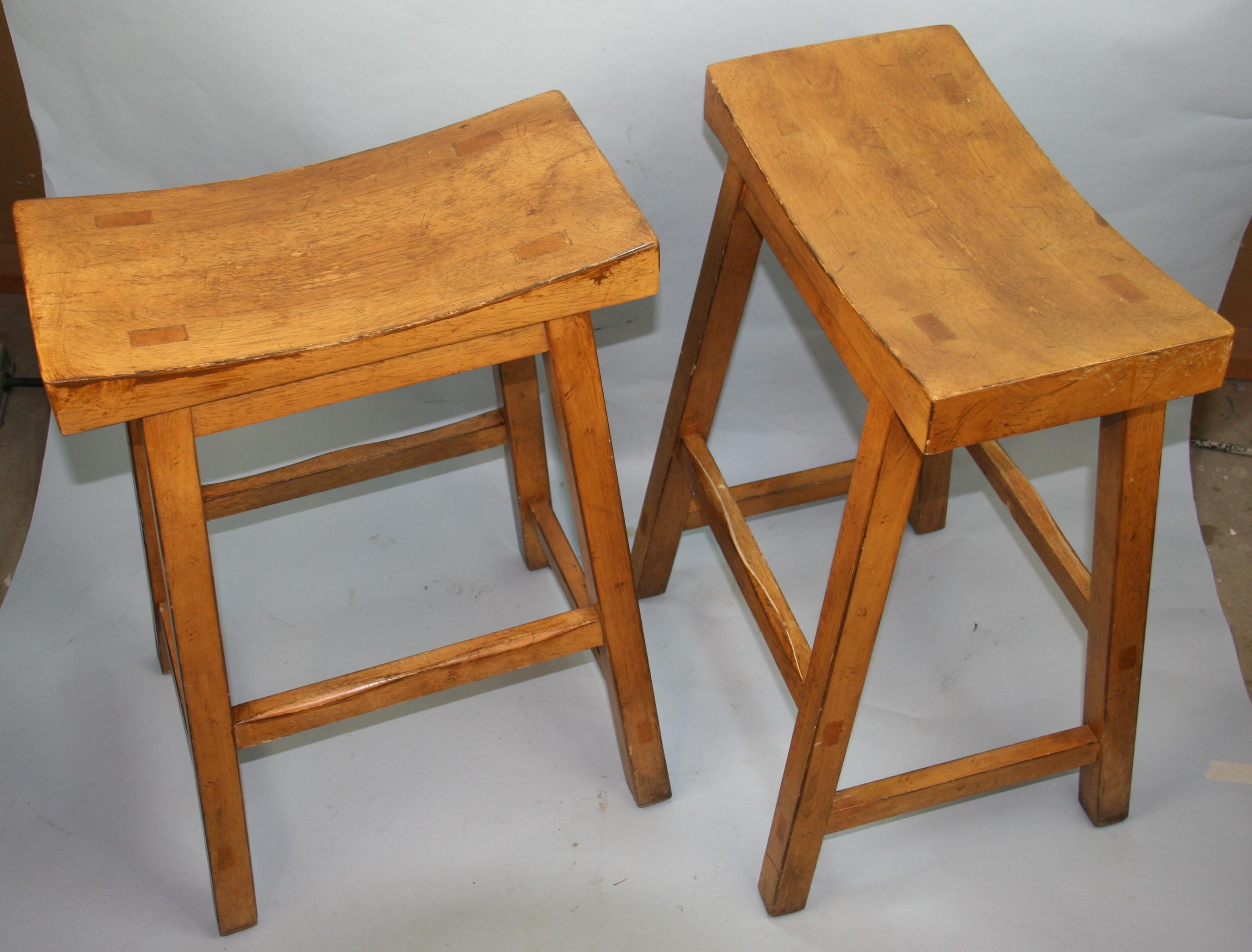 Pair Scandinavian curved top solid beech wood bar stools
with mortar and tensor construction.