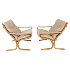 Pair Scandinavian Modern beige Leather Siesta Low Safari Lounge Chairs Westnofa