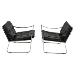 Pair Scandinavian modern black leather Safari sling chairs by Karin Mobrin Ikea
