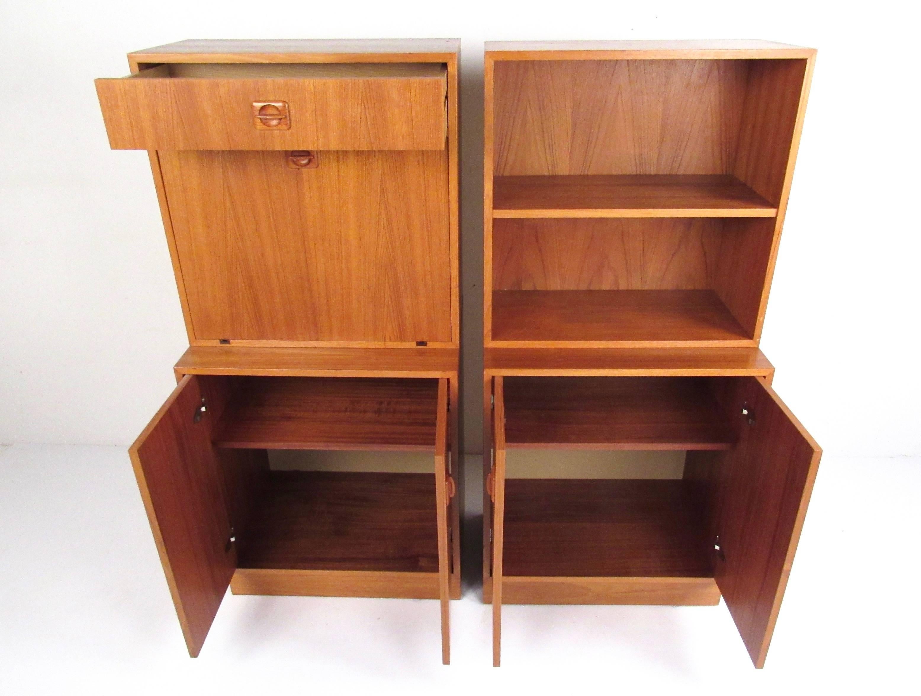 This stylish pair of teak cabinets feature a versatile array of storage, work, and display space. With Scandinavian modern style design, carved door pulls, and teak finish this sharp looking pair is perfect for office or home interiors. Adjustable