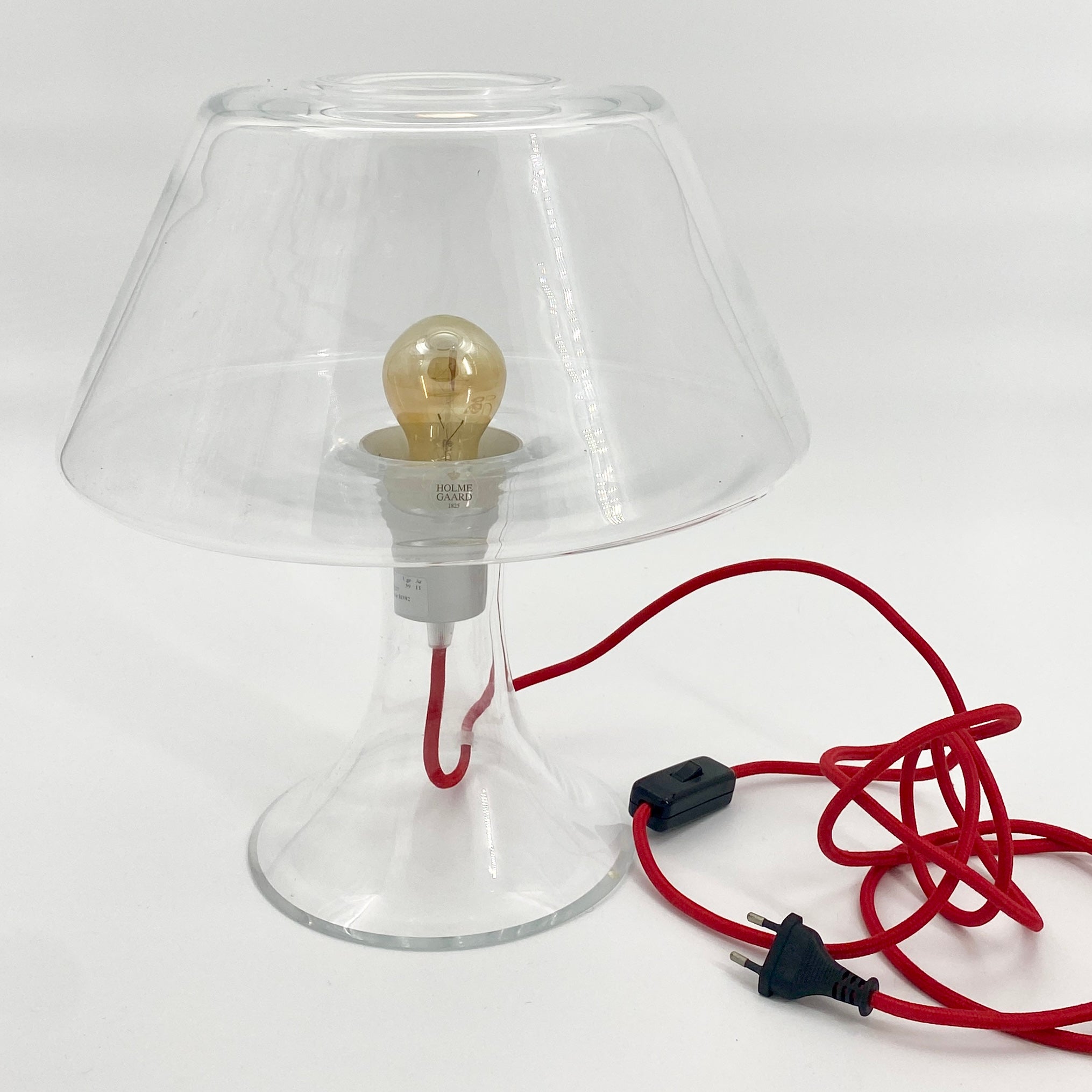 This pair of Danish Modern clear glass shade and table lamps Are Designed By Maria Berntsen for Holmegaard.

This 