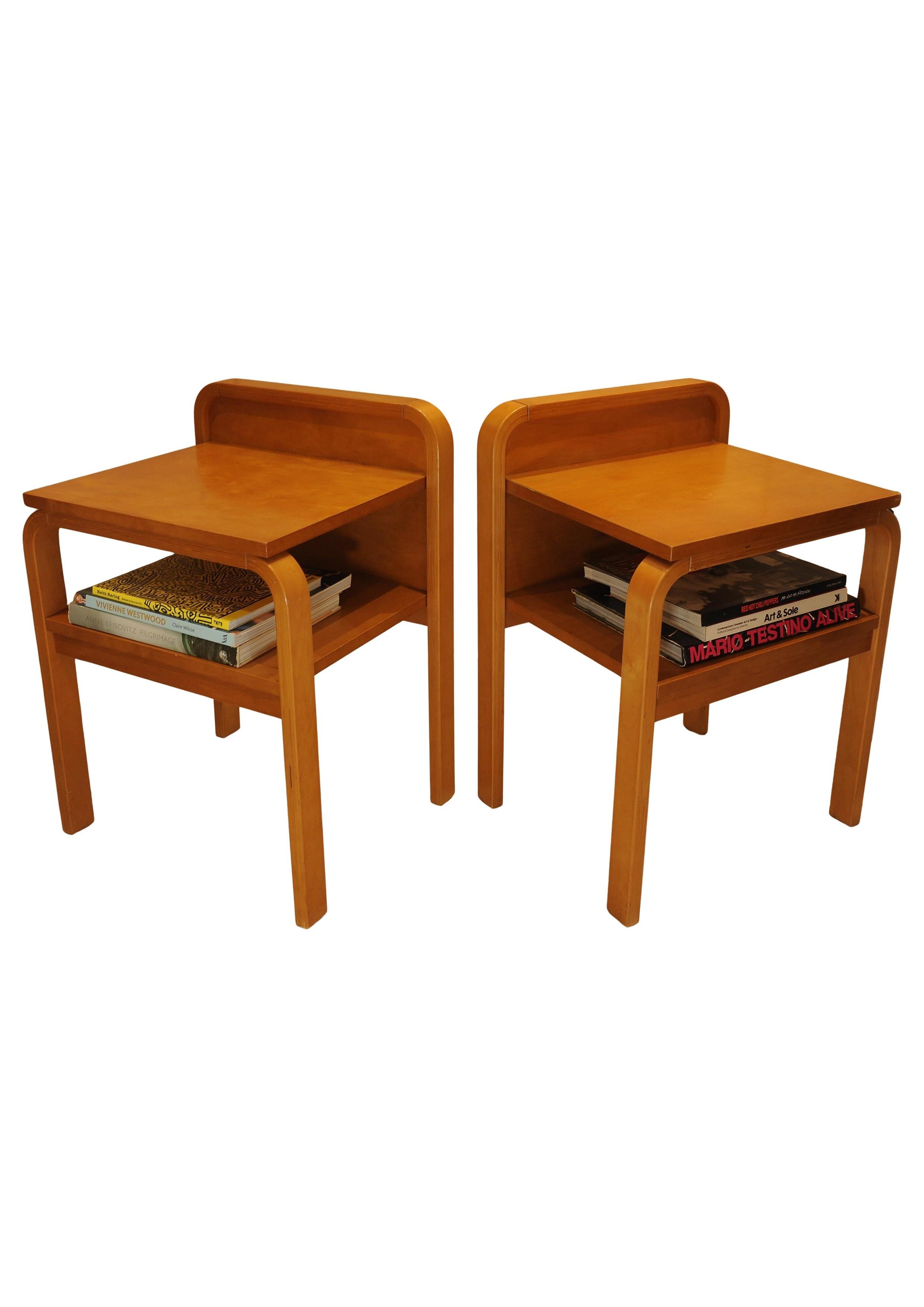 A beautiful pair of original Isku Oy of Finland, Scandinavian Modern, bent plywood birch bedside tables with maker's labels 1980s. In the style of Alvar Aalto.

Finding inspiration in Finnish forests, in pure raw materials, using environmentally
