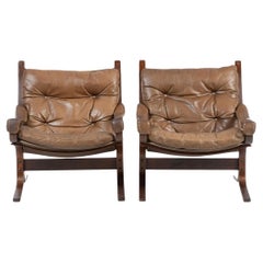 Paar skandinavische moderne braune Siesta-Safari-Loungesessel aus Leder, Westnofa, skandinavisch-modern
