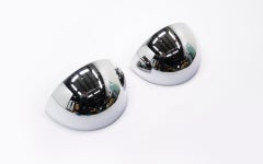Coppia di applique di Lightolier, semicerchi in acciaio cromato, firmate con etichetta in carta
