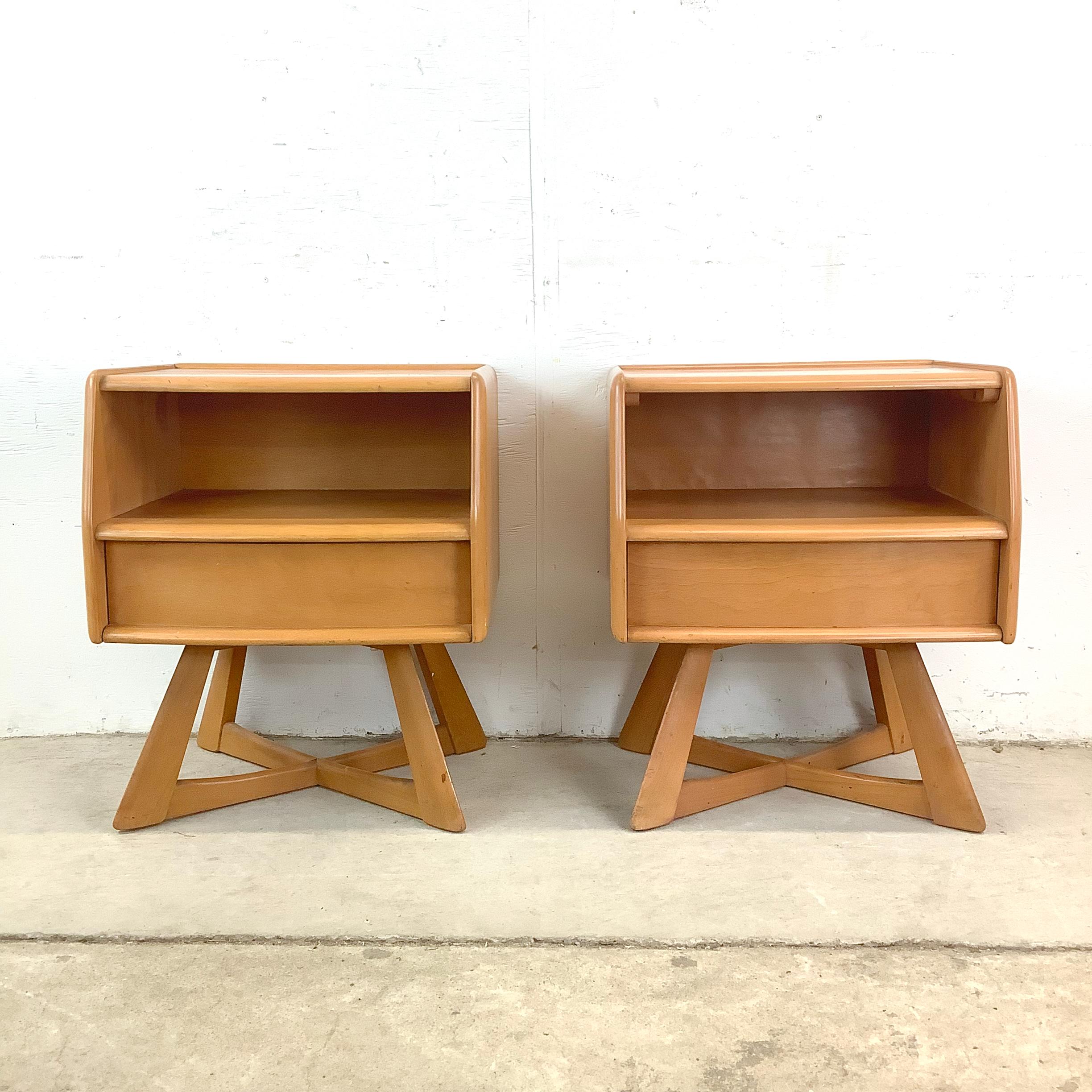 For lovers of mid-century design, it doesn’t get much better than this elegant pair of Sculptura nightstands by Heywood-Wakefield. Featuring the hallmark Champagne finish and an unforgettable sculptural X-base, these nightstands are pure vintage