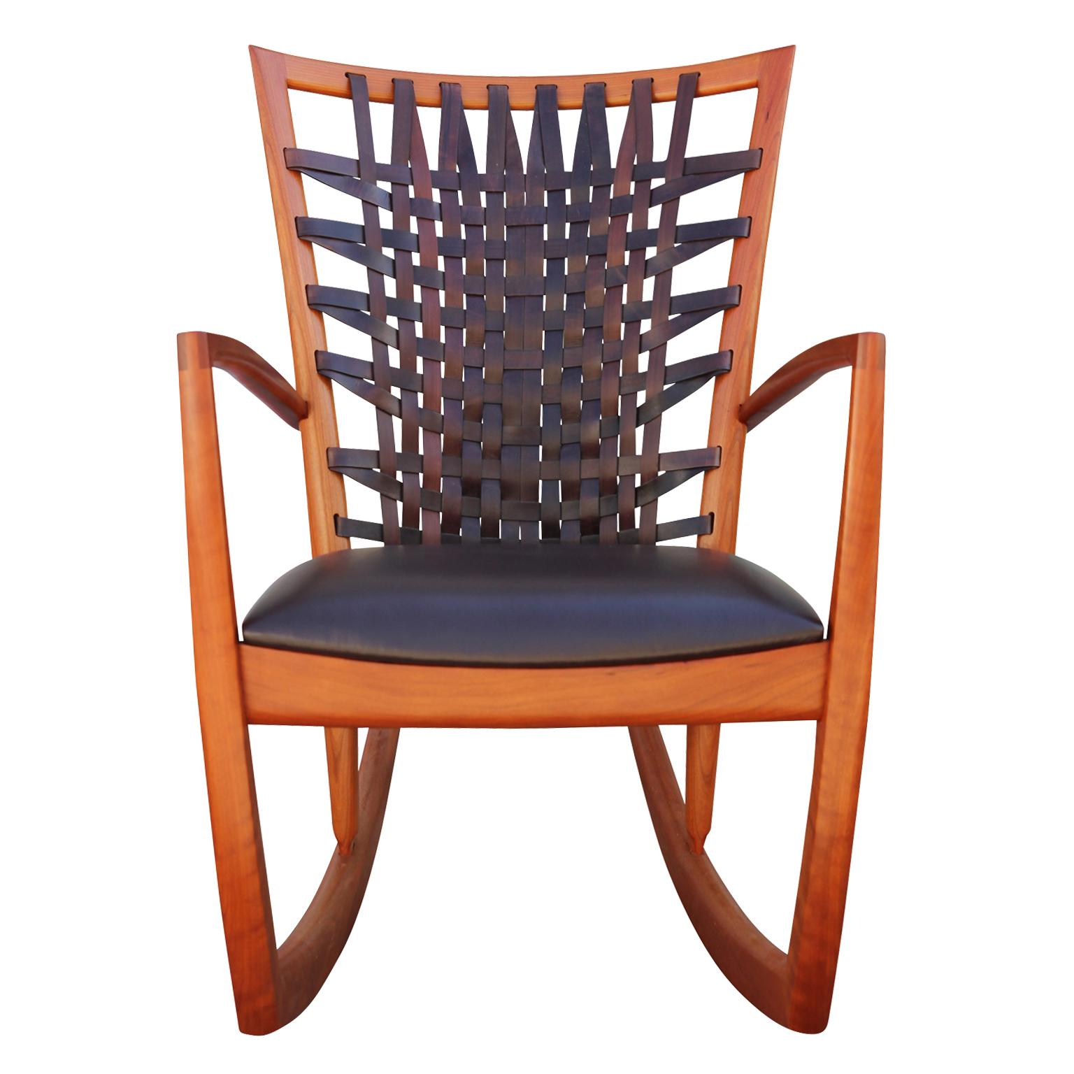 American Pair of Sculptural Modern Handmade Cherrywood and Woven Leather Rocking Chairs